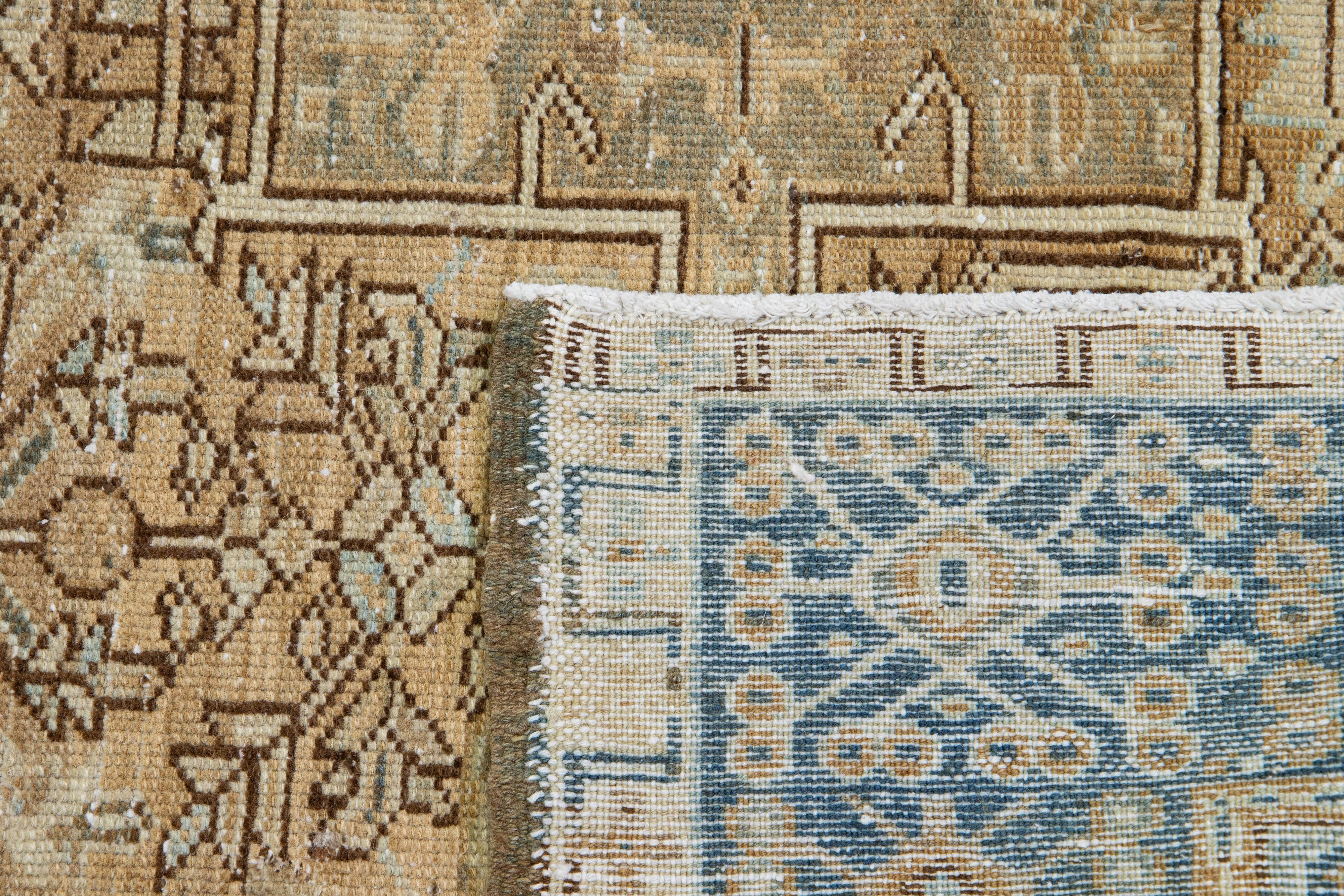 Geometric Antique Heriz Handmade Wool Runner featuring a Brown Field For Sale 1