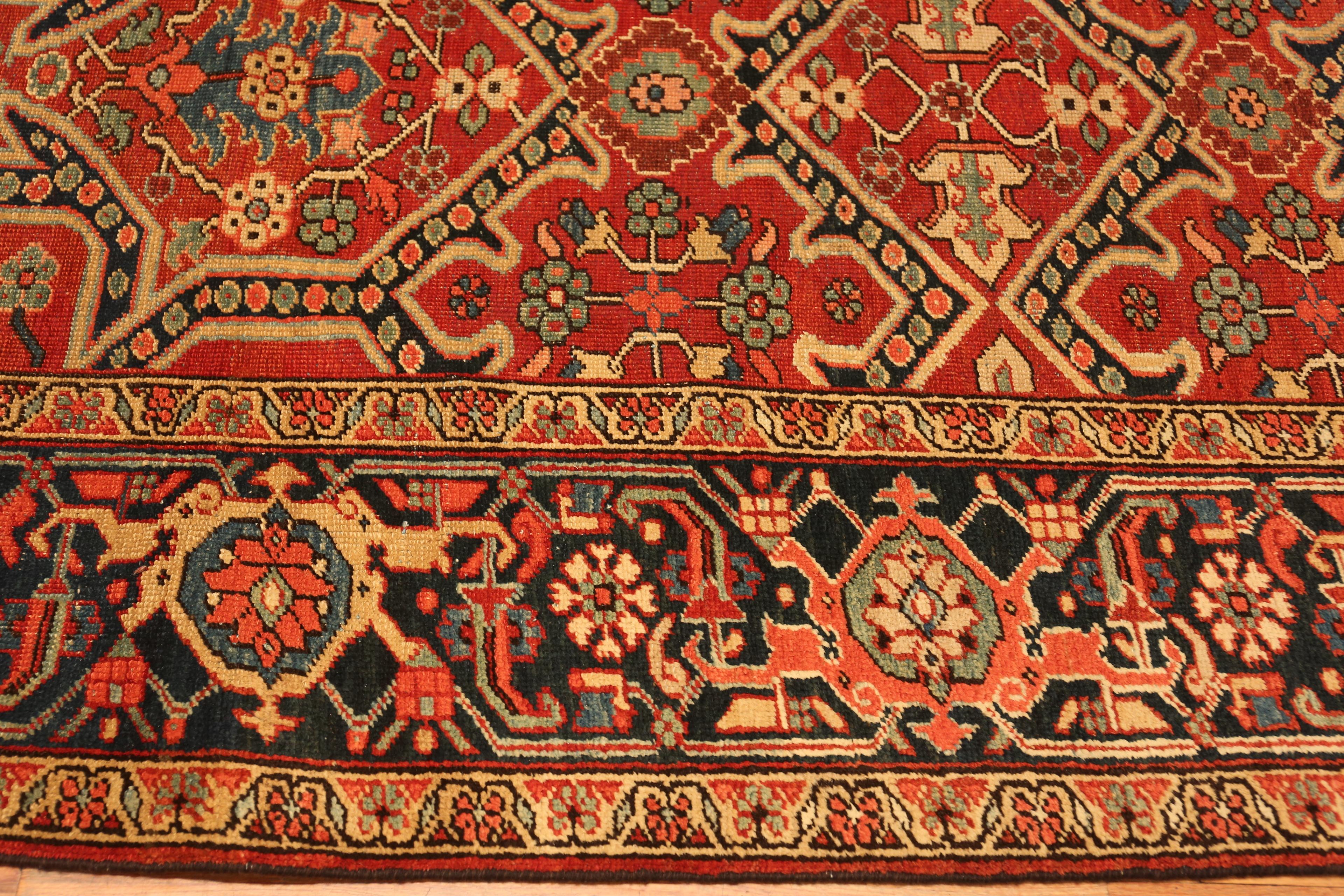 Geometric Antique Persian Heriz Rug, Country of Origin / rug type: Persian Rugs, Circa date: 1920. Size: 9 ft 2 in x 11 ft 8 in (2.79 m x 3.56 m)
 
