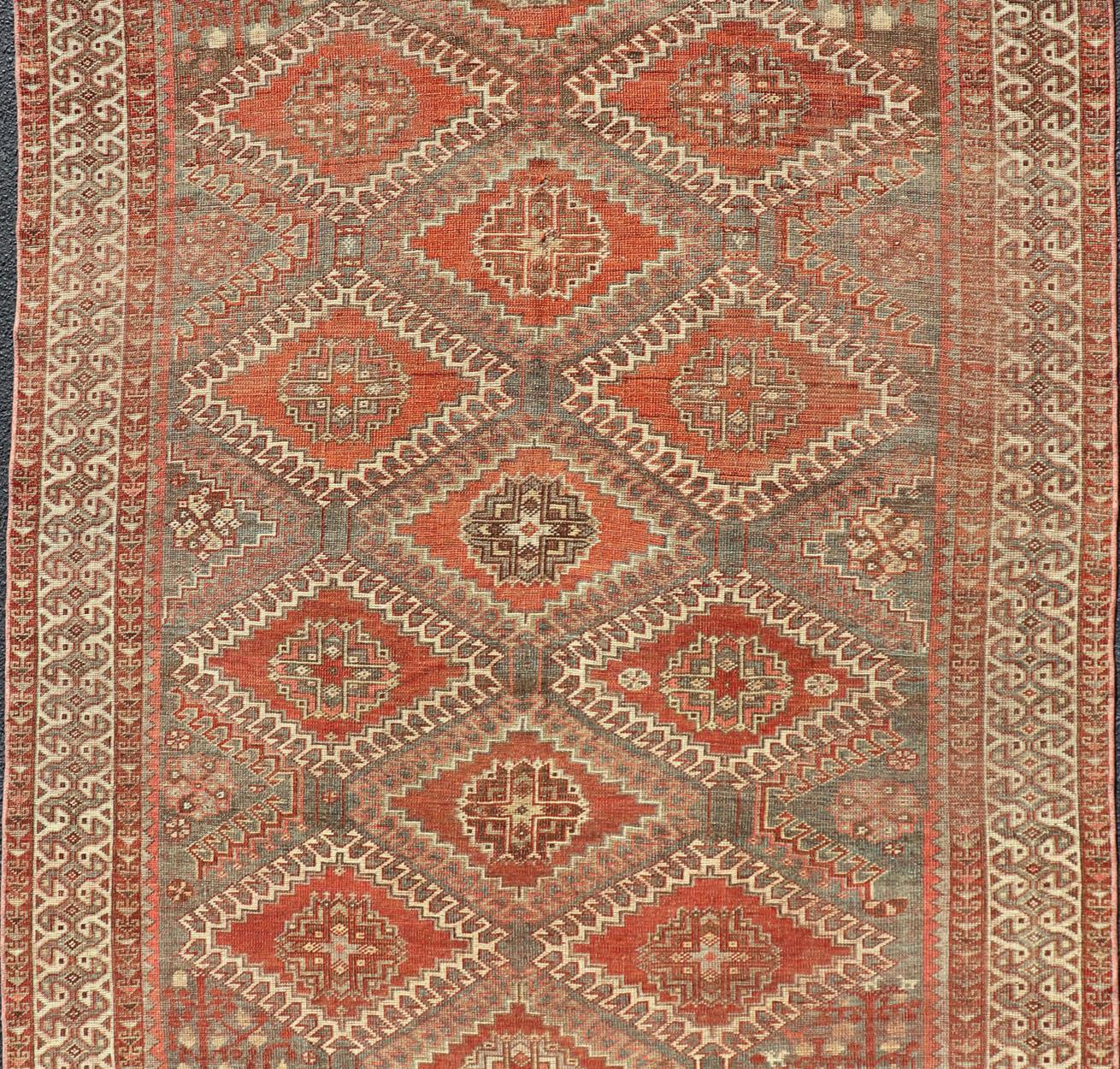 20th Century Geometric Antique Persian Shiraz Rug with All-Over Medallion Design For Sale
