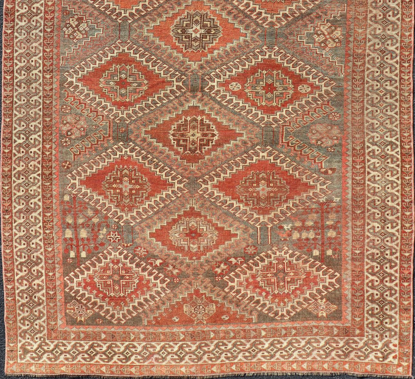 Wool Geometric Antique Persian Shiraz Rug with All-Over Medallion Design For Sale