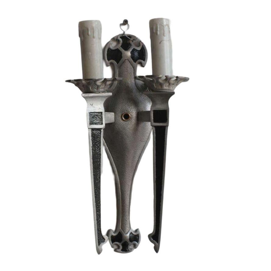 Vintage 1920s geometric Art Deco aluminum wall sconces with black overlaid enamel showcasing a Classic deco style. Stamped “Cal 69634 Des Patented“ along the back.