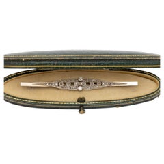 Geometric Art Deco brooch with diamonds in original Luis Sanz case.