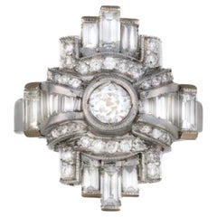 Geometric Baguette
Round Diamond Ring