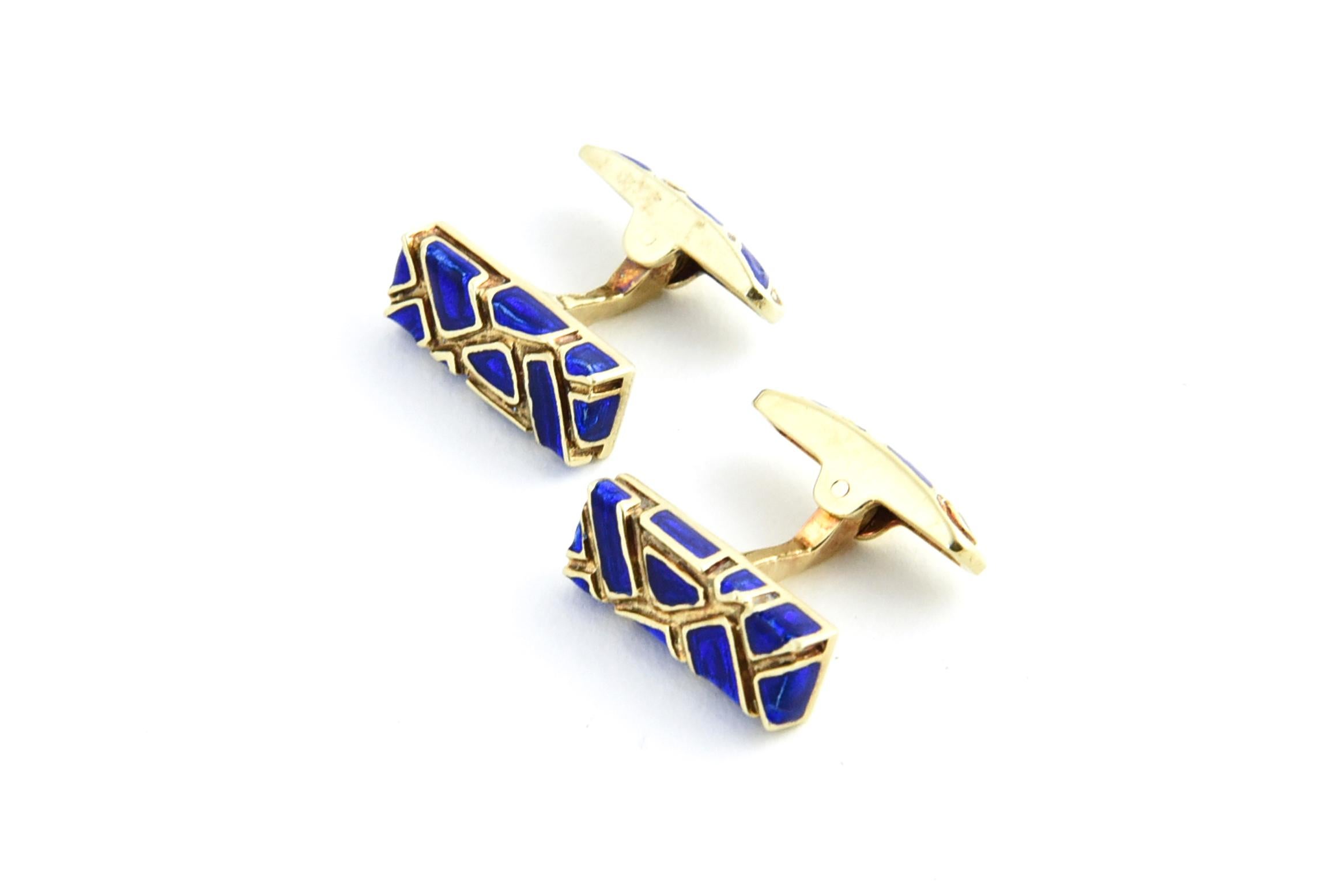 Elegant double sided blue enamel and 14k yellow gold cufflinks that feature an easy to use T-bar back.