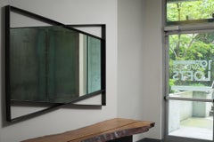 Miroir à nœud papillon, acier noirci, géométrique, par Force/Collide