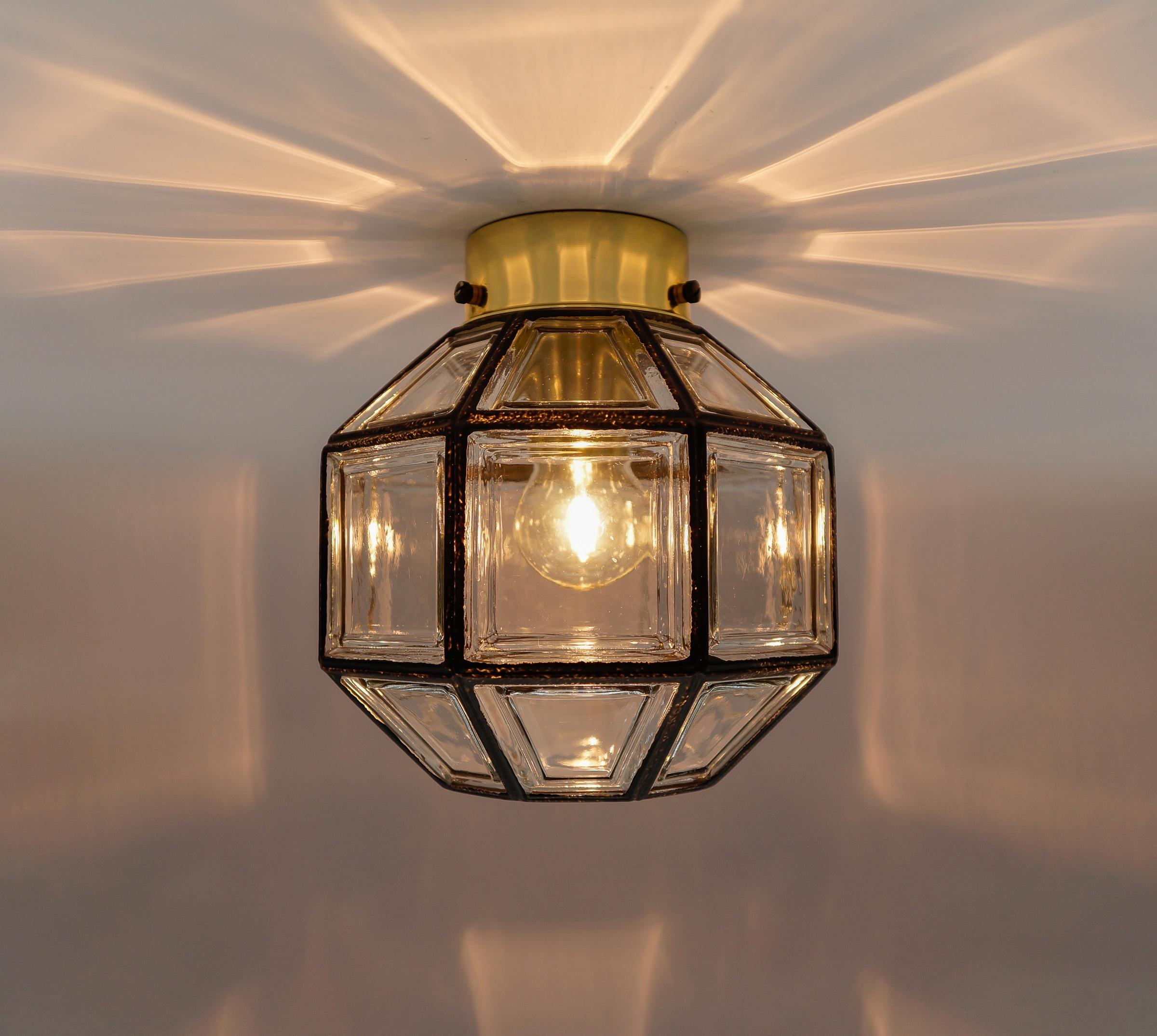 This pair of wall sconces or flush mounts holds one E27 socket each.

Each lamp requires E27 bulbs.
  