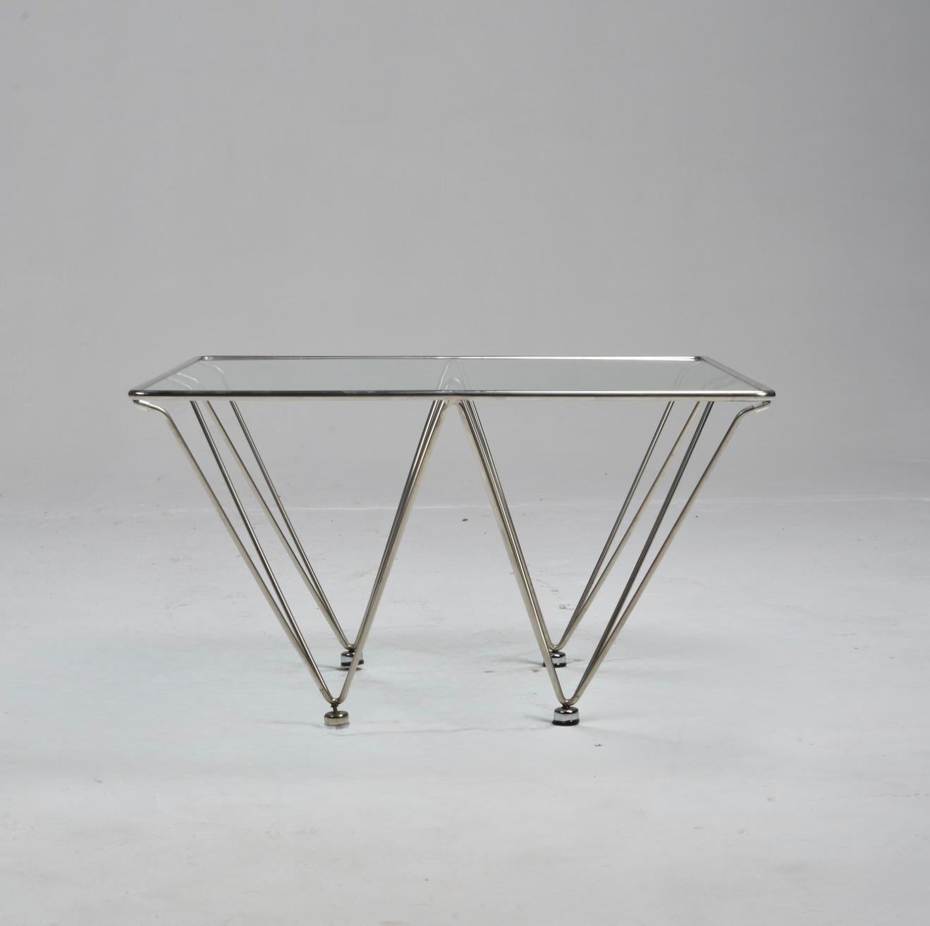 Late 20th Century Geometric chrome and glass coffee table attributed to Paolo Piva For Sale