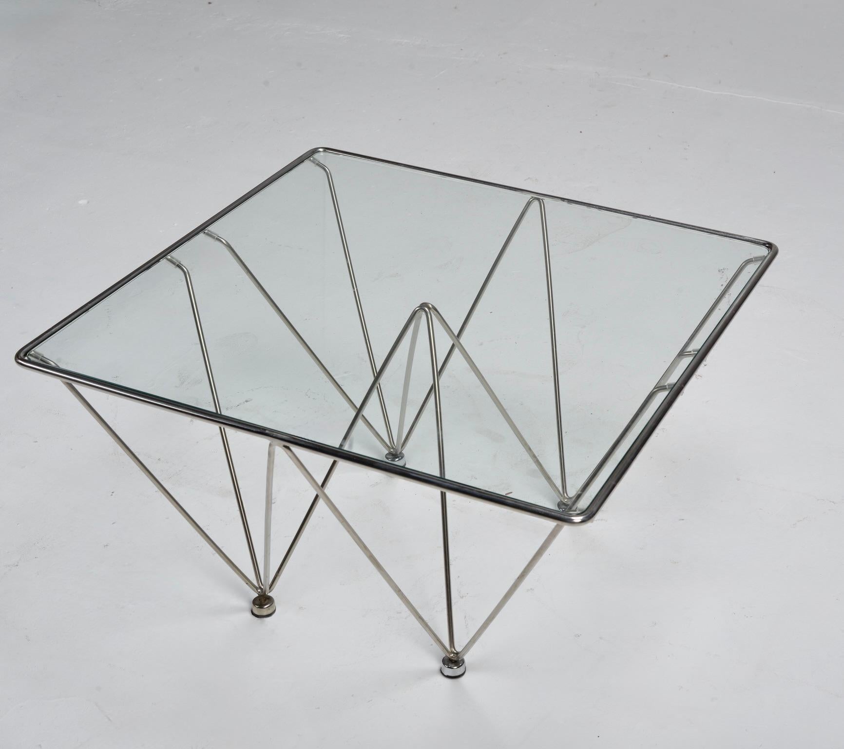 Glass Geometric chrome and glass coffee table attributed to Paolo Piva For Sale
