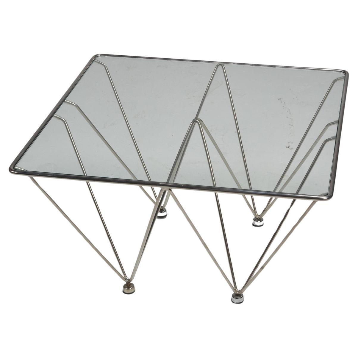 Geometric chrome and glass coffee table attributed to Paolo Piva For Sale
