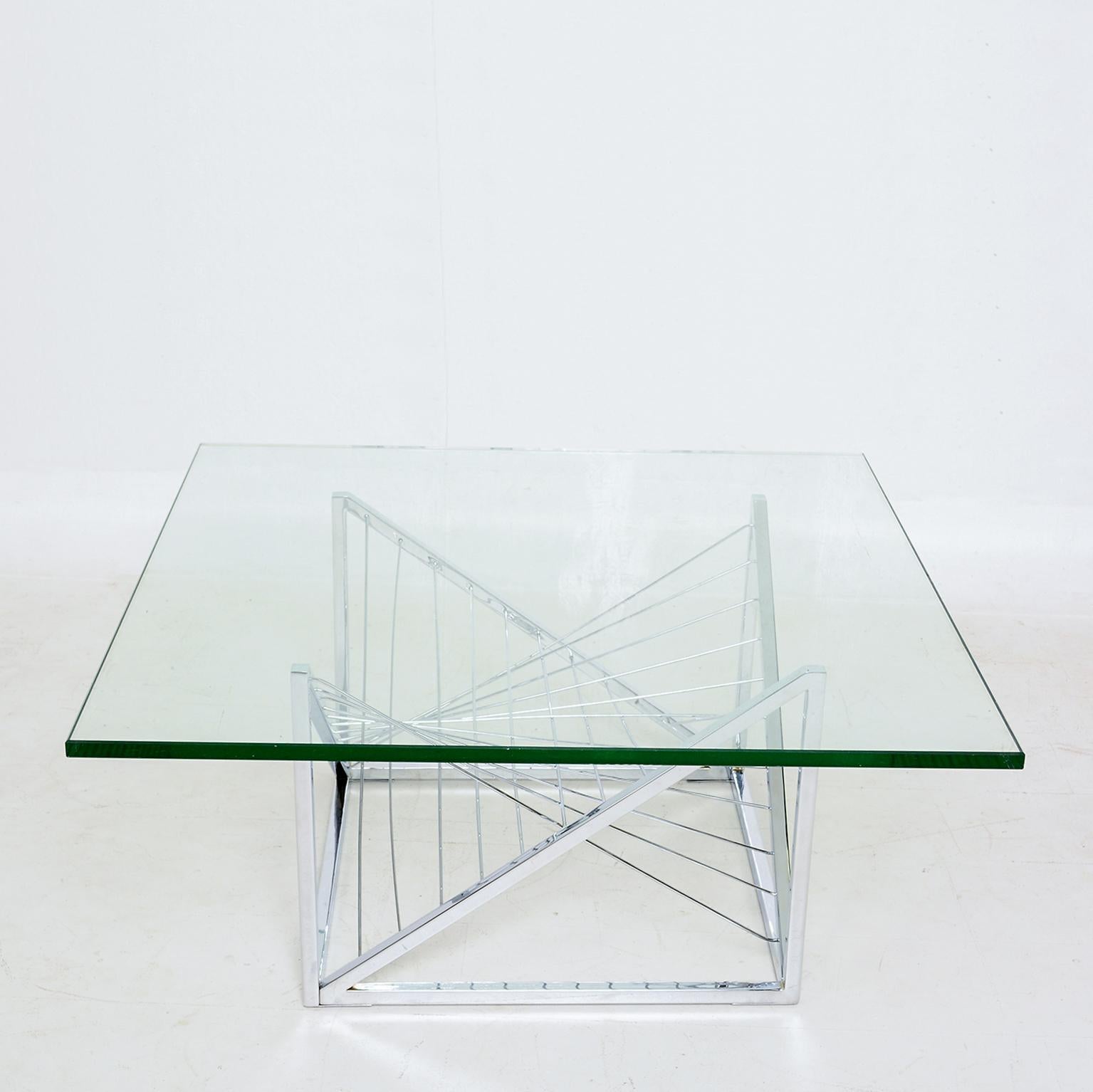 Metal Table Base
Geometric sculptural chrome coffee table with intricate metal work, wire designed base, attributed to Diego Matthai, Mexico, circa 1980s
Unmarked
Dimensions: H 15.5 in. x W 22 in. x D 22 in.
No glass is included. 
In original