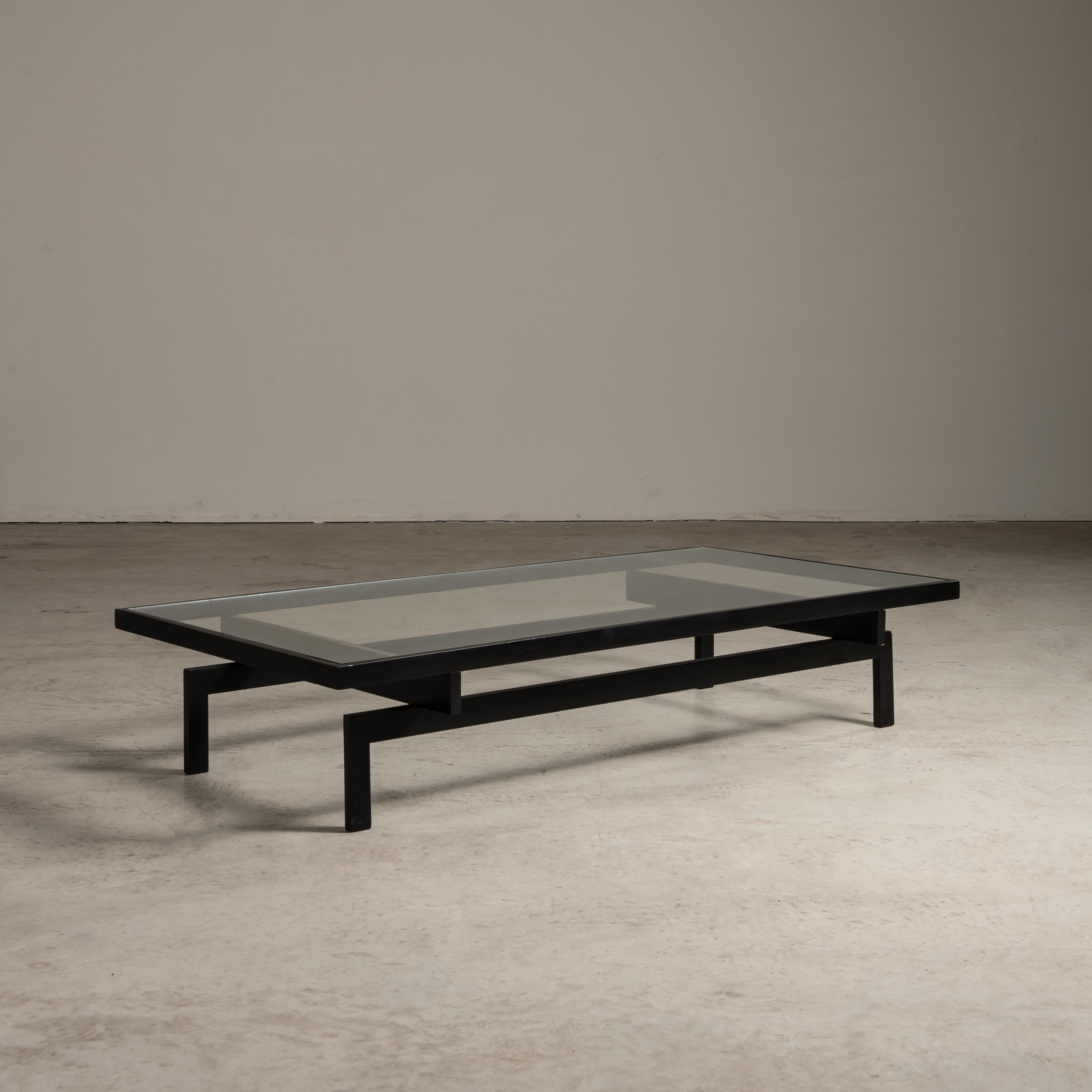 Embodying the essence of Brazilian mid-century modern design, this center table by Branco & Preto studio is a statement piece that harmoniously blends the sleek lines of contemporary aesthetics with the rich tradition of Brazilian furniture design.