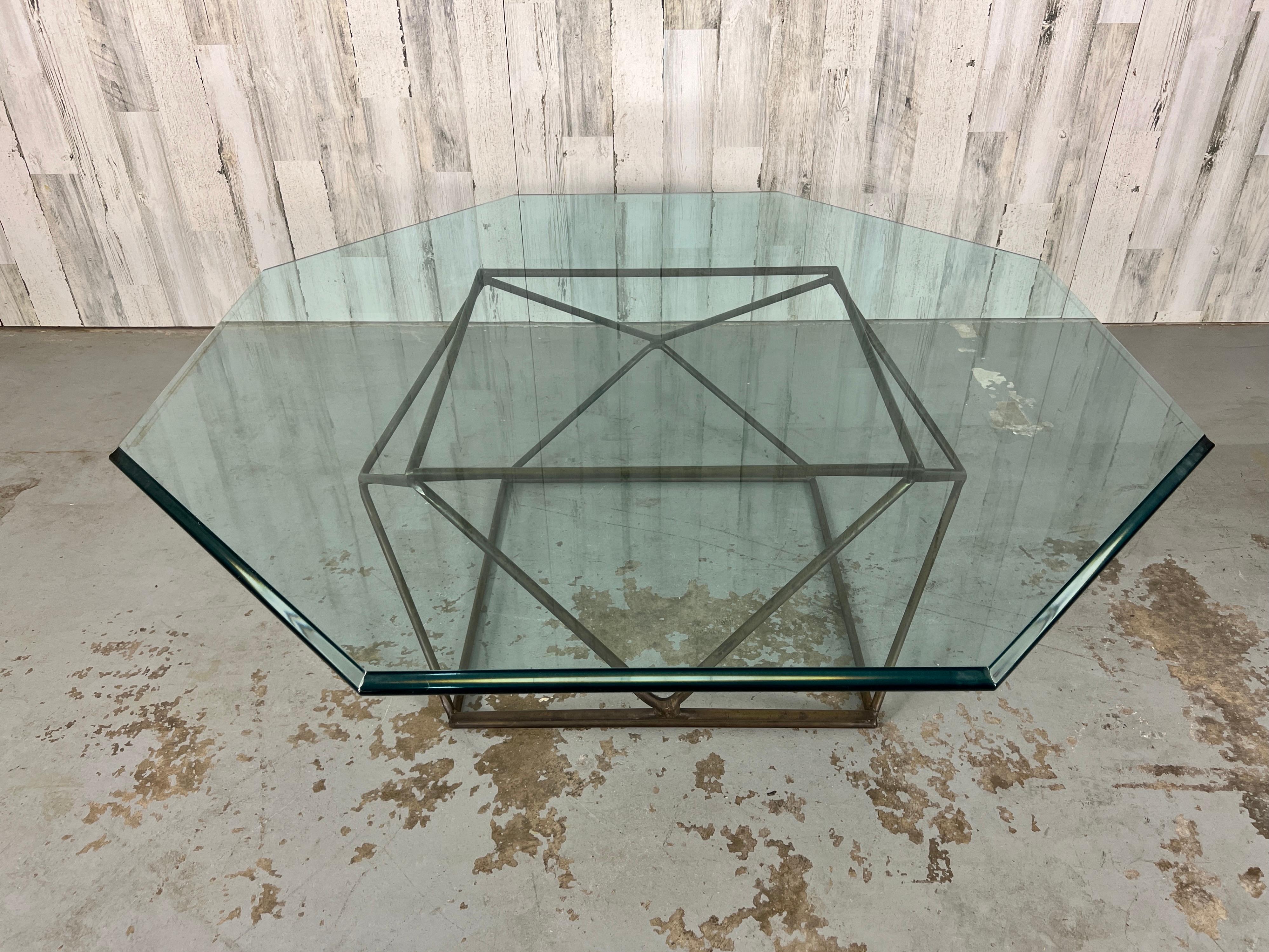 Beautiful 1970s Geometric Bronze finish base with glass.                                                                       
 Glass top is 47.75