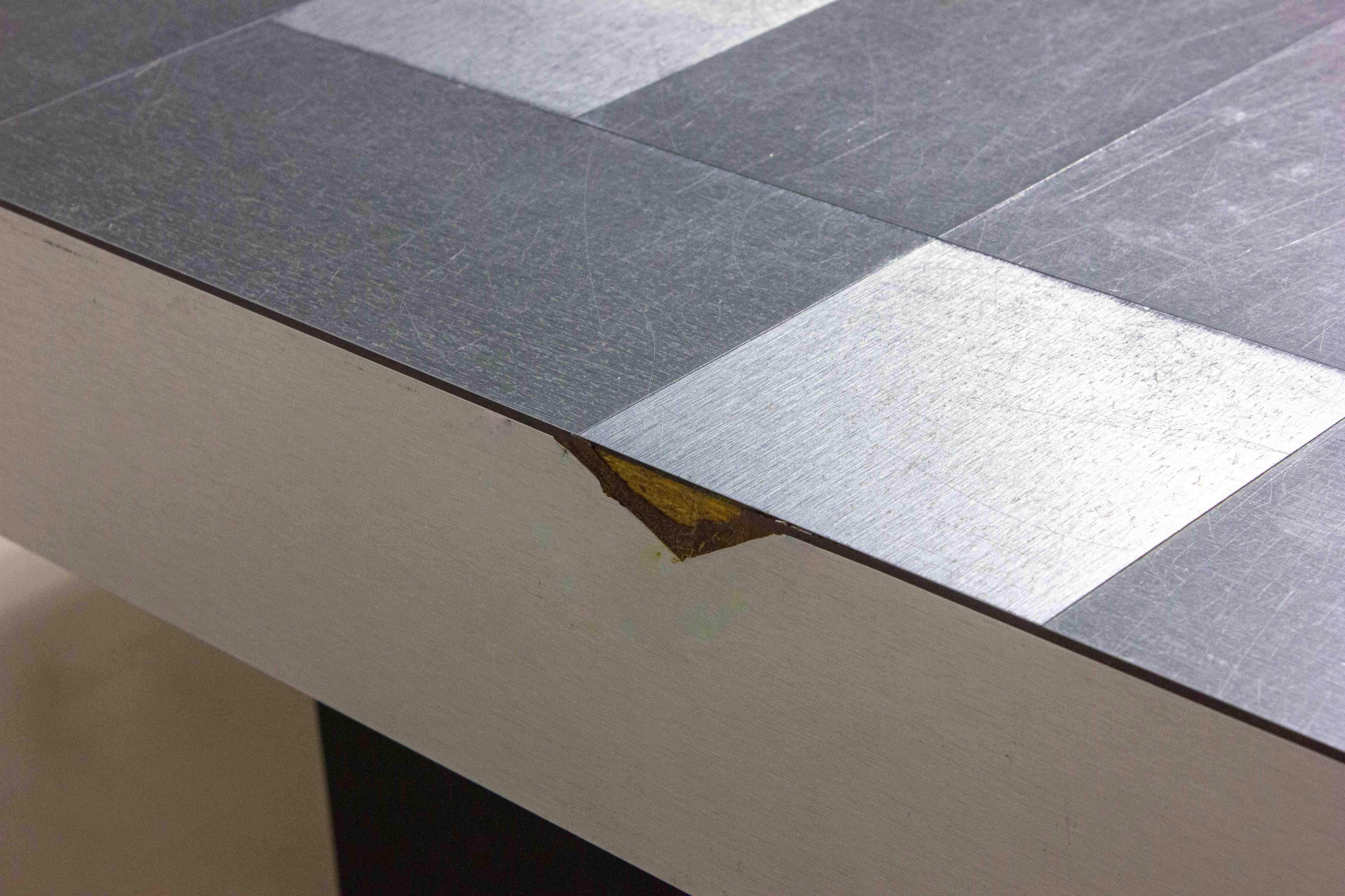 Geometric Coffee Table with Brushed Metal Surface (1970s) In Fair Condition For Sale In Antwerpen, VAN