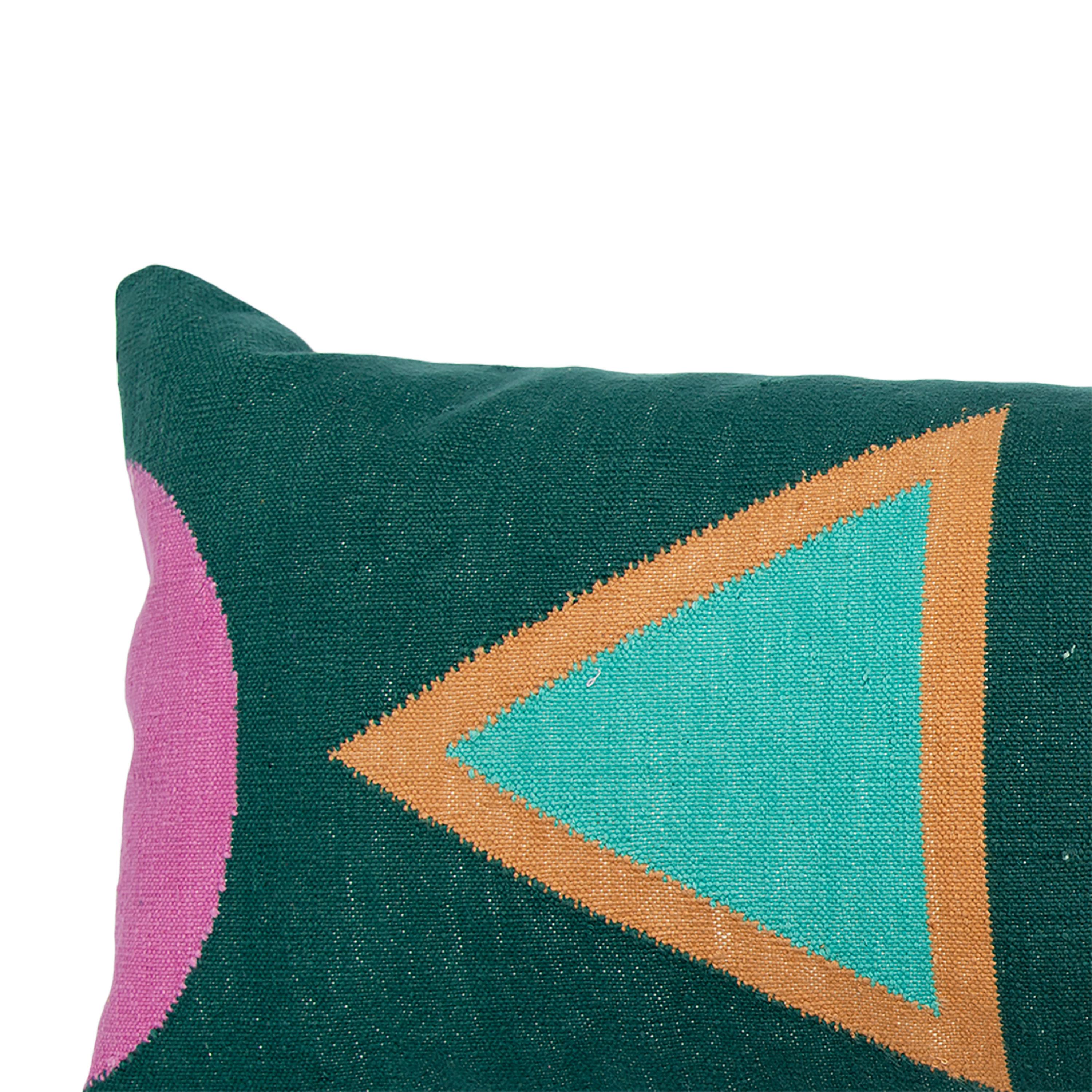 Our lumbar throw pillows are ethically hand woven by artisans in Rajasthan, India, using a traditional weaving technique which is native to this region.

The purchase of this handcrafted pillow helps to support the artisans and preserve their