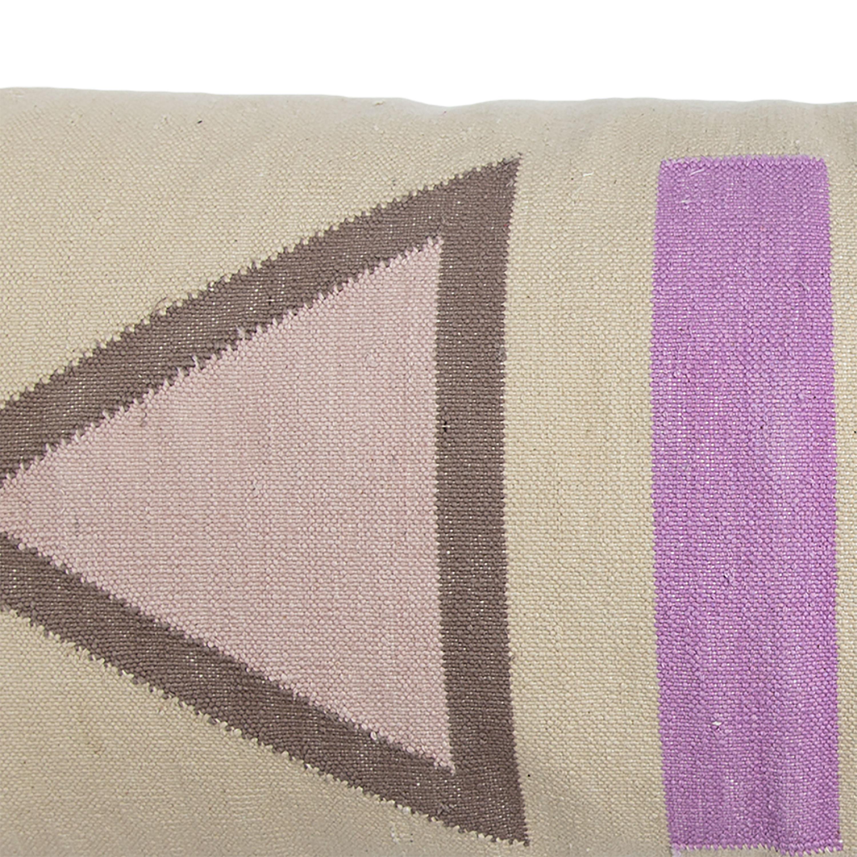 Our lumbar throw pillows are ethically hand woven by artisans in Rajasthan, India, using a traditional weaving technique which is native to this region.

The purchase of this handcrafted pillow helps to support the artisans and preserve their