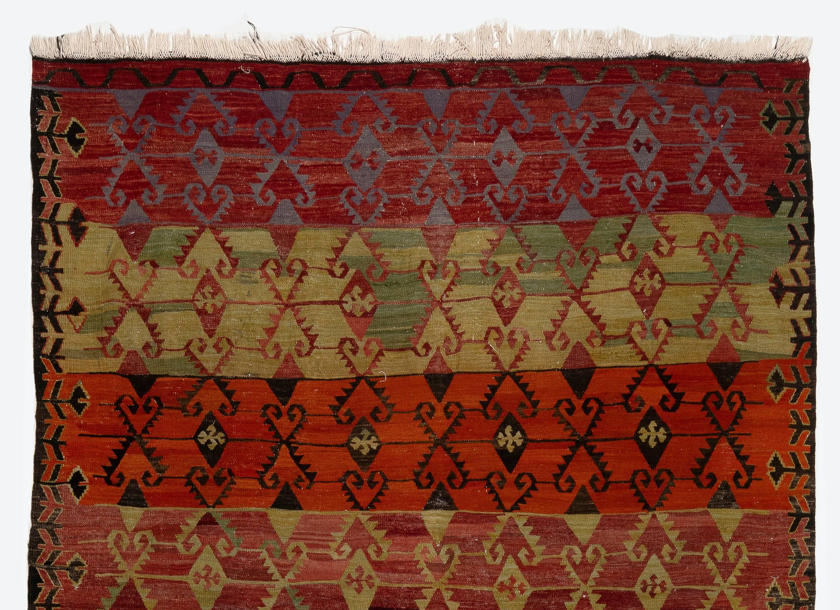 Vintage handwoven flat-weave (Kilim) with geometric design, 100% wool. Measures: 6 x 13 ft
Reversible; both sides can be used.
Ideal for both residential and commercial interiors.
We can supply a suitable rug-pad if requested for extra cushioning