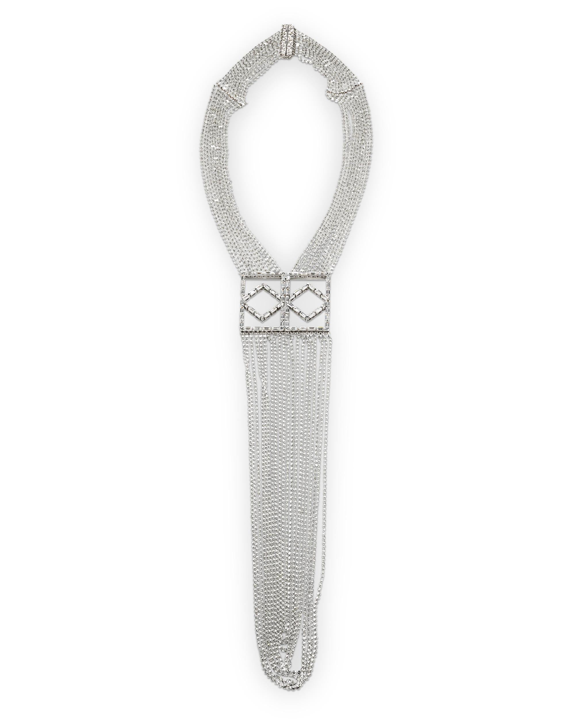 Hundreds of white diamond beads form the strands of this luxurious Art Deco-inspired necklace. It is a bold variation on the classic diamond necklace, sparkling from each angle with an astounding 98.89 total carats of diamonds. The beaded design