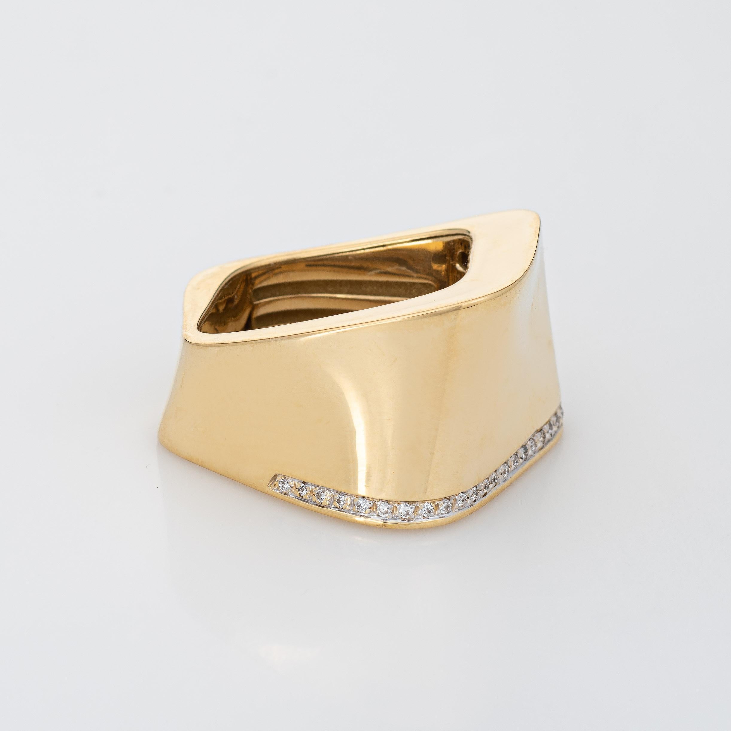 Stylish geometric diamond ring (circa 1990s to 2000s) crafted in 18 karat yellow gold. 

Diamonds total an estimated 0.15 carats (estimated at H-I color and SI1-2 clarity). 

K di Kuore is a noted Italian jeweler, known for classic pieces with a