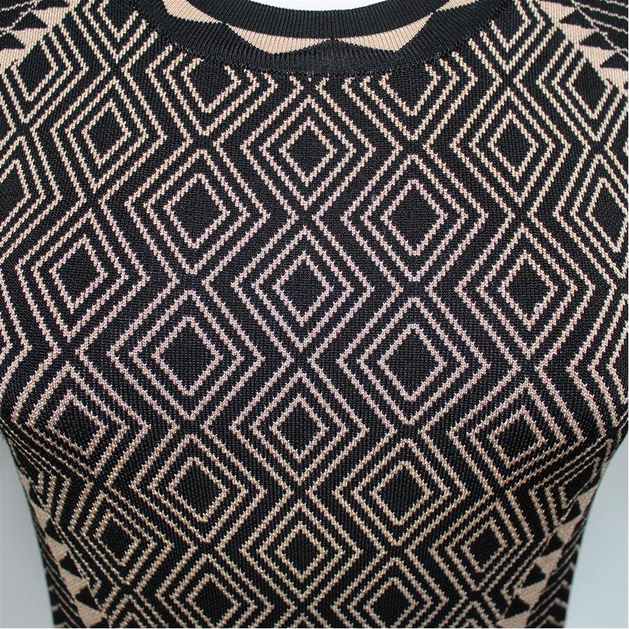 Rayon (85%) Spandex Black and beige color Geometric design Total length cm 85 (33.4 inches) Shoulders cm 35(13.7 inches)
