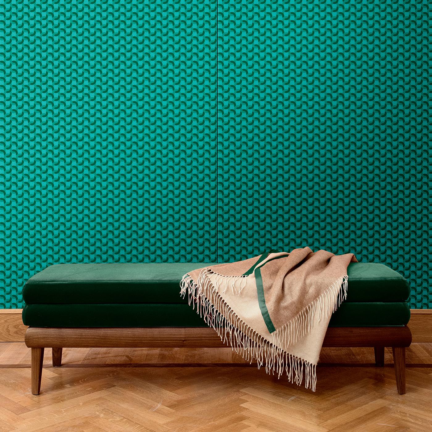 Part of the Geometric collection of wall coverings boasting an abstract motif, this piece was crafted of silk and cotton blending different shades of green to obtain a mesmerizing texture that will suit any elegant interior. This piece comes as