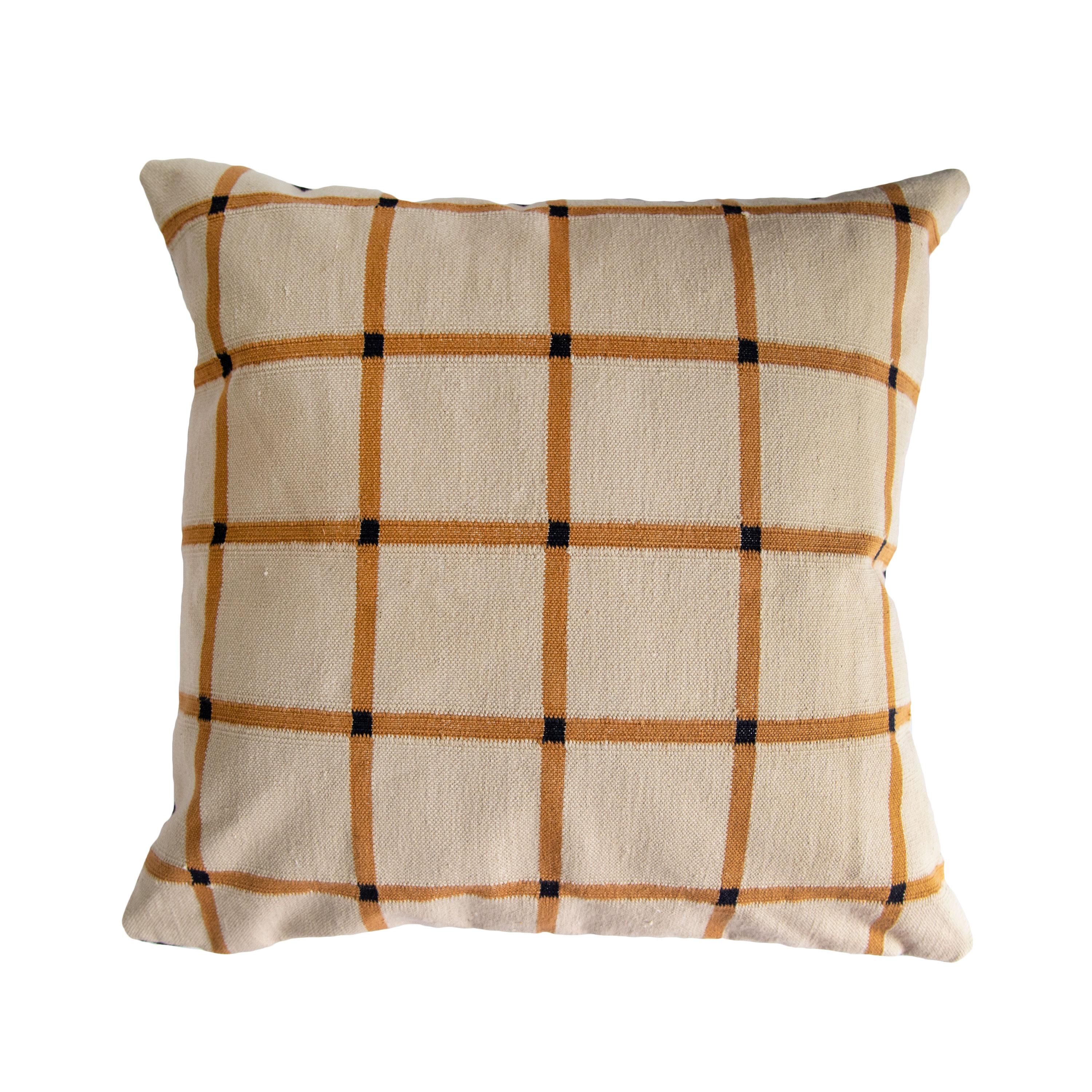 This pillow is reversible!

Our grid pillows are ethically hand woven by artisans in Rajasthan, India, using a traditional weaving technique which is native to this region.

The purchase of this handcrafted pillow helps to support the artisans
