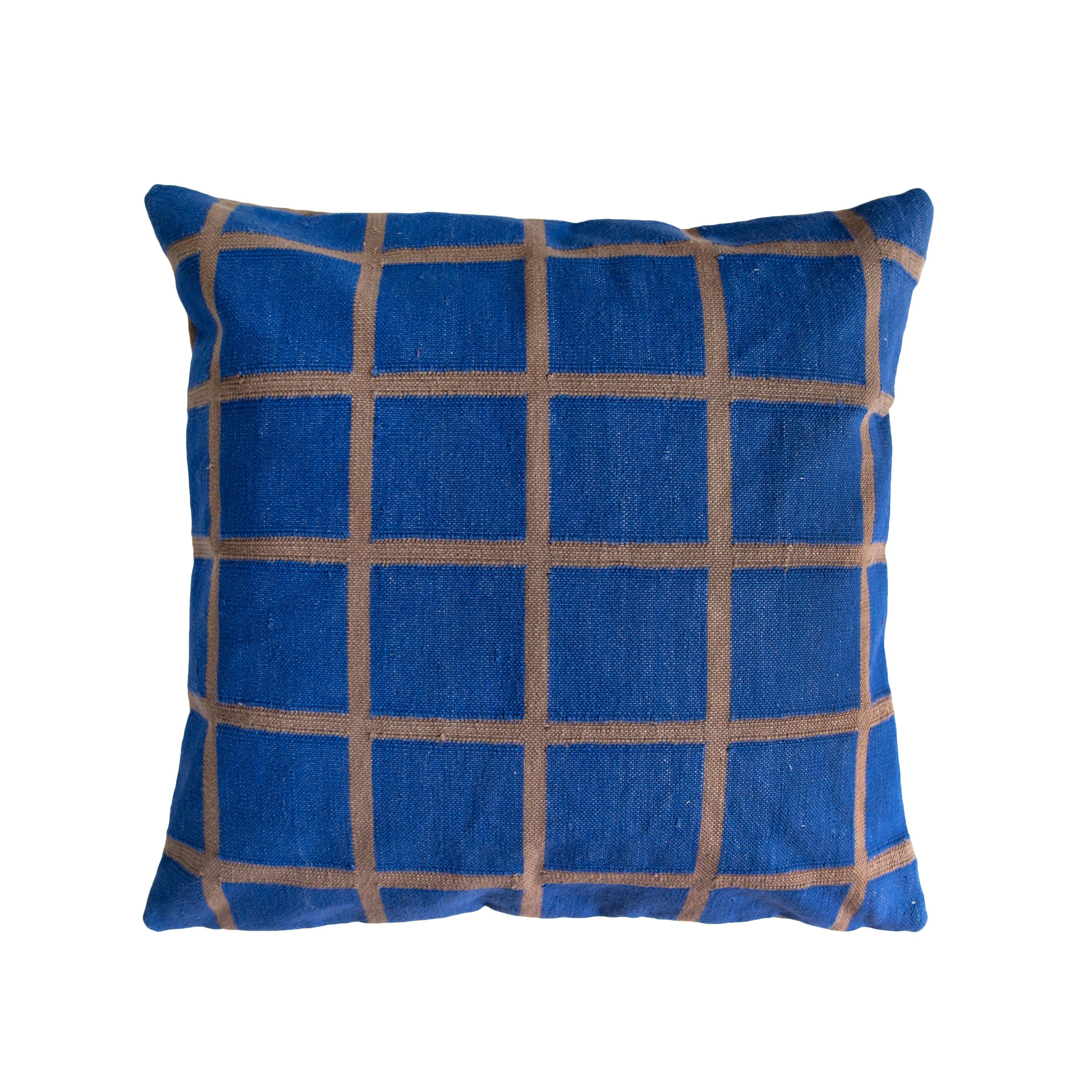 This pillow is reversible!

Our grid pillows are ethically hand woven by artisans in Rajasthan, India, using a traditional weaving technique which is native to this region.

The purchase of this handcrafted pillow helps to support the artisans and