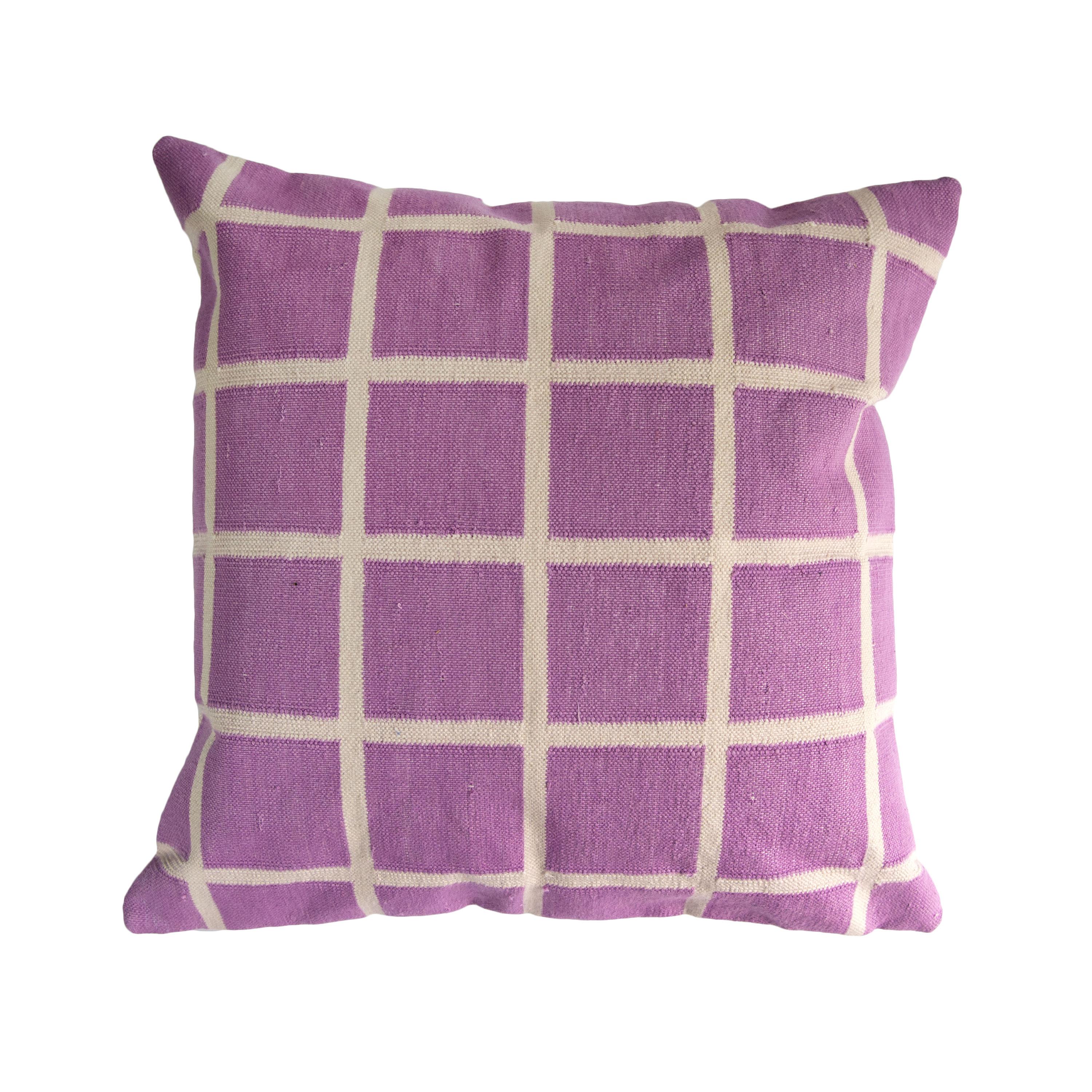 This pillow is reversible!

Our grid pillows are ethically hand woven by artisans in Rajasthan, India, using a traditional weaving technique which is native to this region.

The purchase of this handcrafted pillow helps to support the artisans