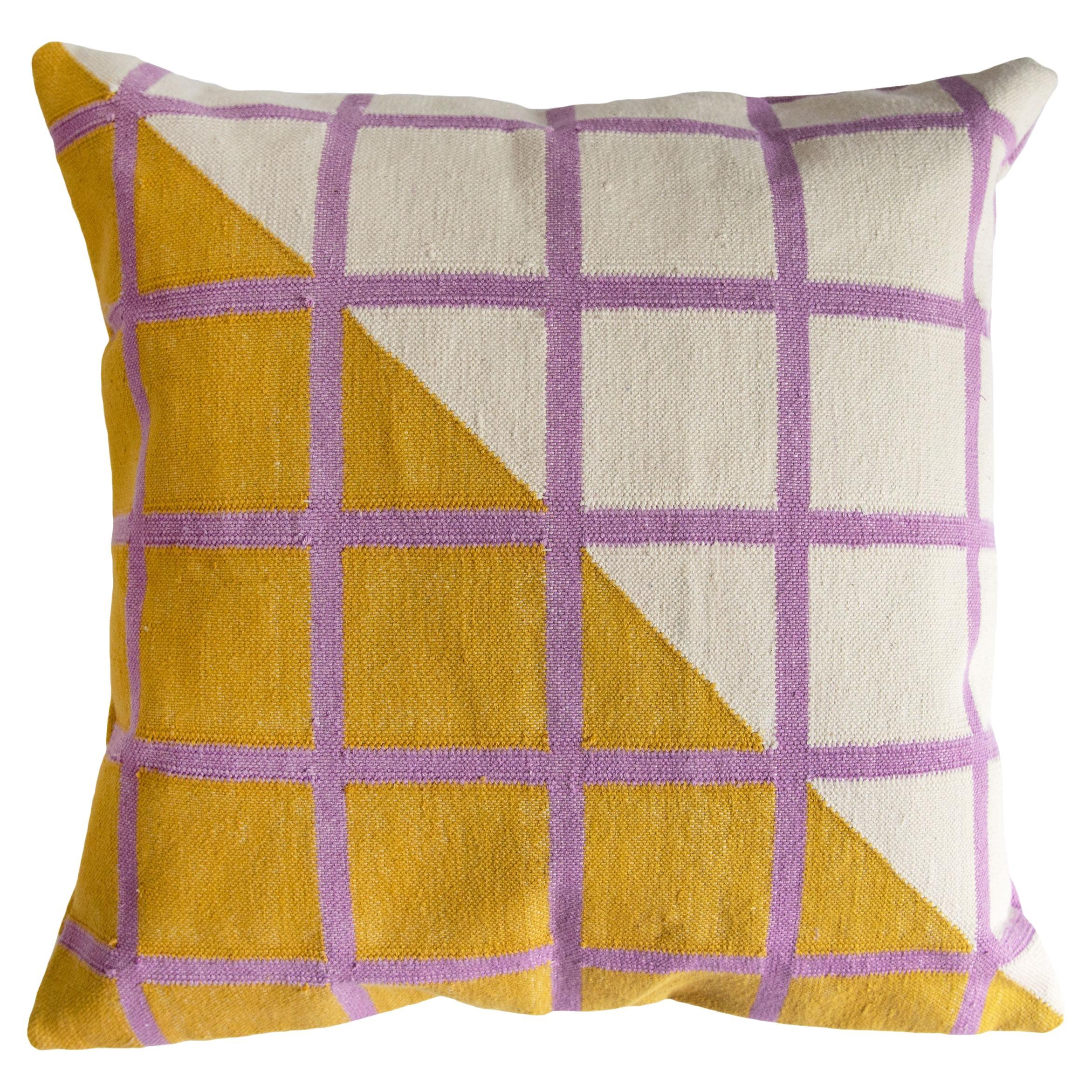 This pillow is reversible!

Our grid pillows are ethically hand woven by artisans in Rajasthan, India, using a traditional weaving technique which is native to this region.

The purchase of this handcrafted pillow helps to support the artisans