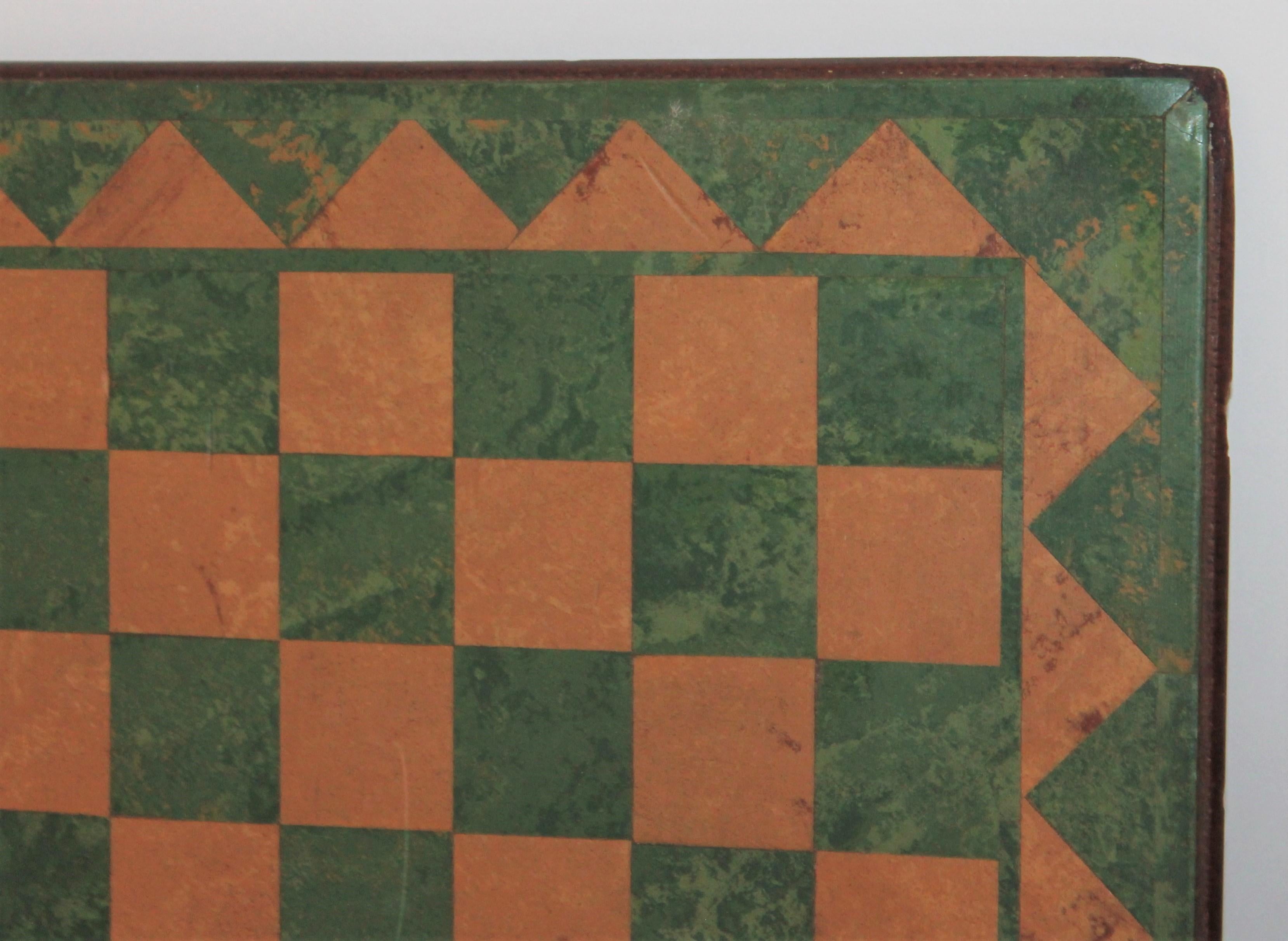 This folky game board is made from vintage linoleum and laid on board. This most unusual Folk Art board is in fine condition.