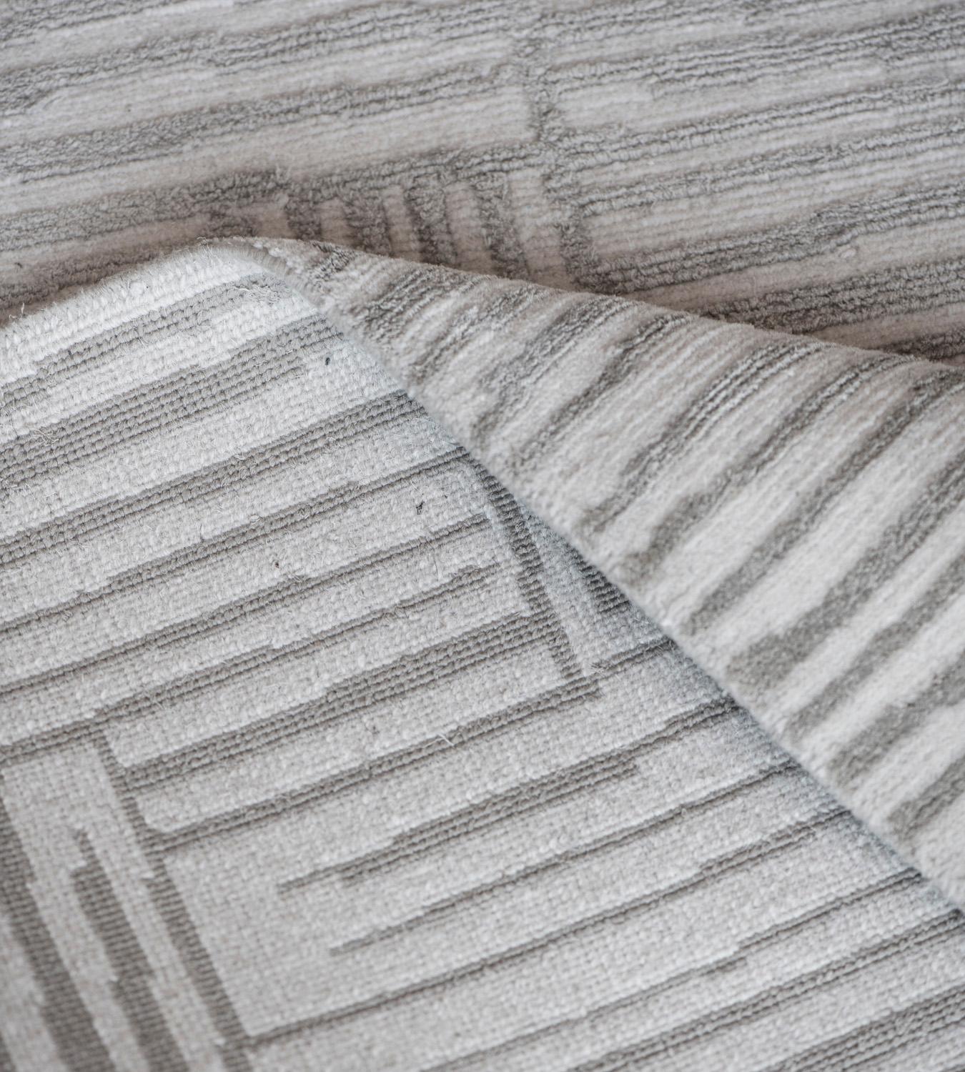 Part of the Mansour Modern collection, this rug is hand-knotted by master weavers using the finest quality weaving techniques and natural materials.