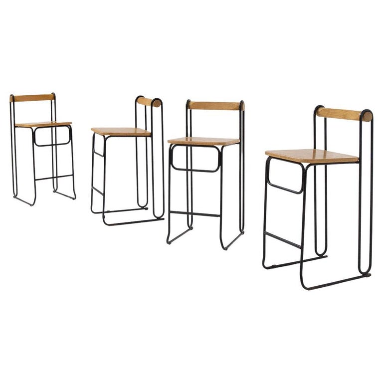 Geometric italian modern high chairs set of four in iron and wood For