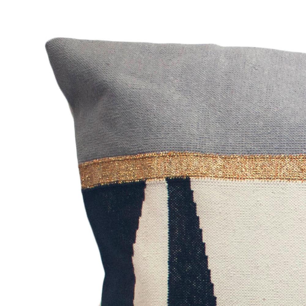 This modern throw pillow has been ethically handwoven by artisans in Rajasthan, India, using a traditional weaving technique which is native to this region.

The purchase of this handcrafted pillow helps to support the artisans and preserve their