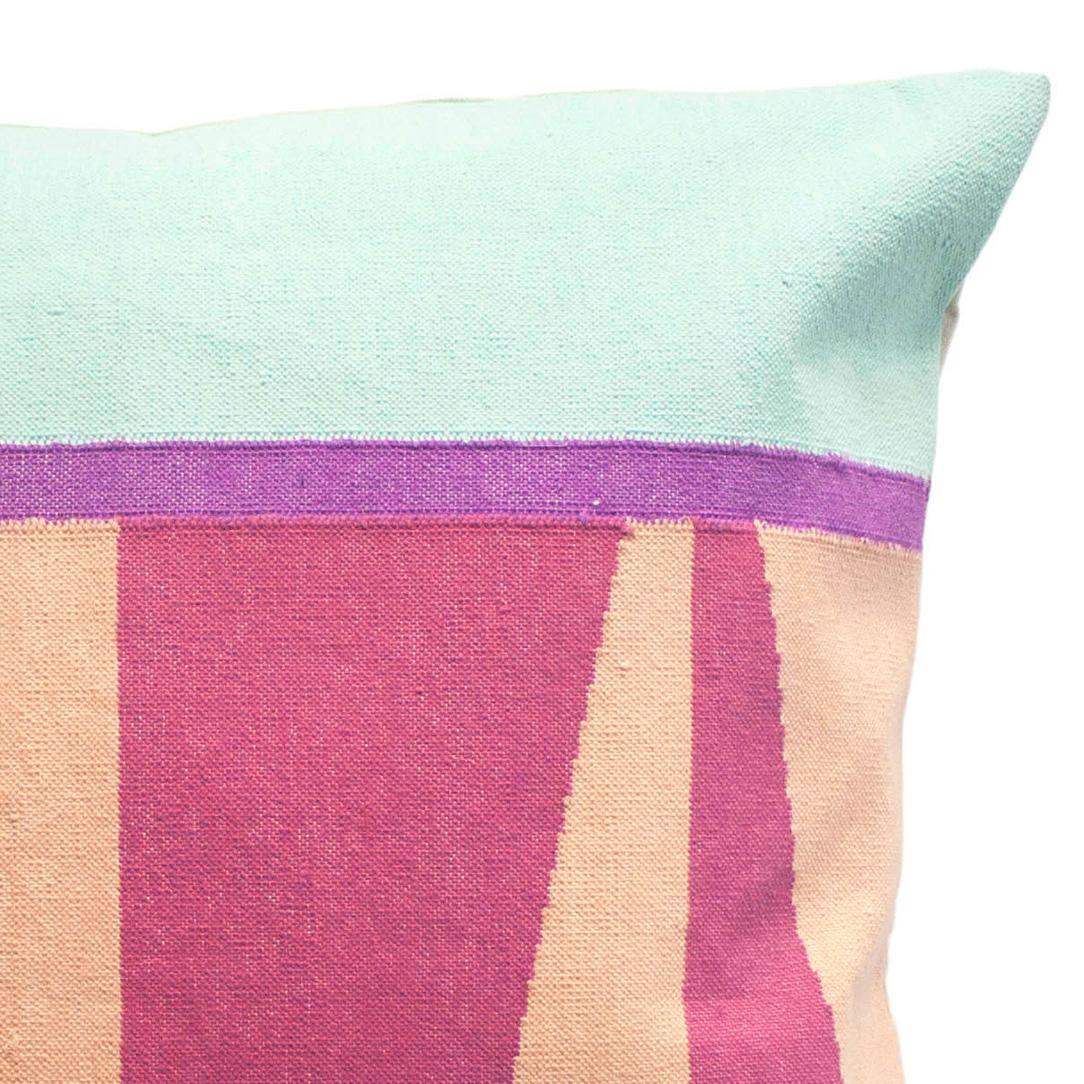 This modern throw pillow has been ethically hand woven by artisans in Rajasthan, India, using a traditional weaving technique which is native to this region.

The purchase of this handcrafted pillow helps to support the artisans and preserve their