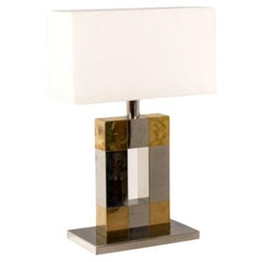 Geometric lamp in silver and gold metal. 1970s.