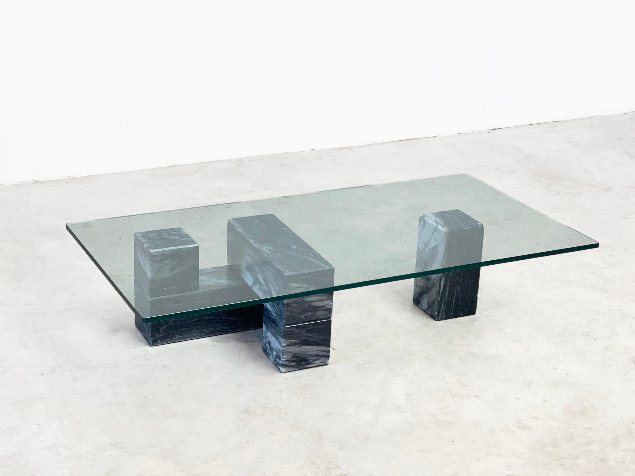 What an elegant coffee table. 
This talfe has 3 separate marble blocks. This is a carrea marble, the table has a luxurious feel and fits within any interior. The blocks can be placed as one wishes. 

 

The marble blocks has some scratches. 

 

