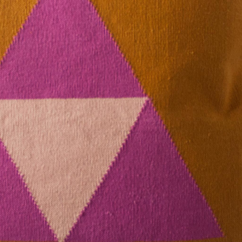 This geometric throw pillow has been ethically hand woven by artisans in Rajasthan, India, using a traditional weaving technique which is native to this region.

The purchase of this handcrafted pillow helps to support the artisans and preserve