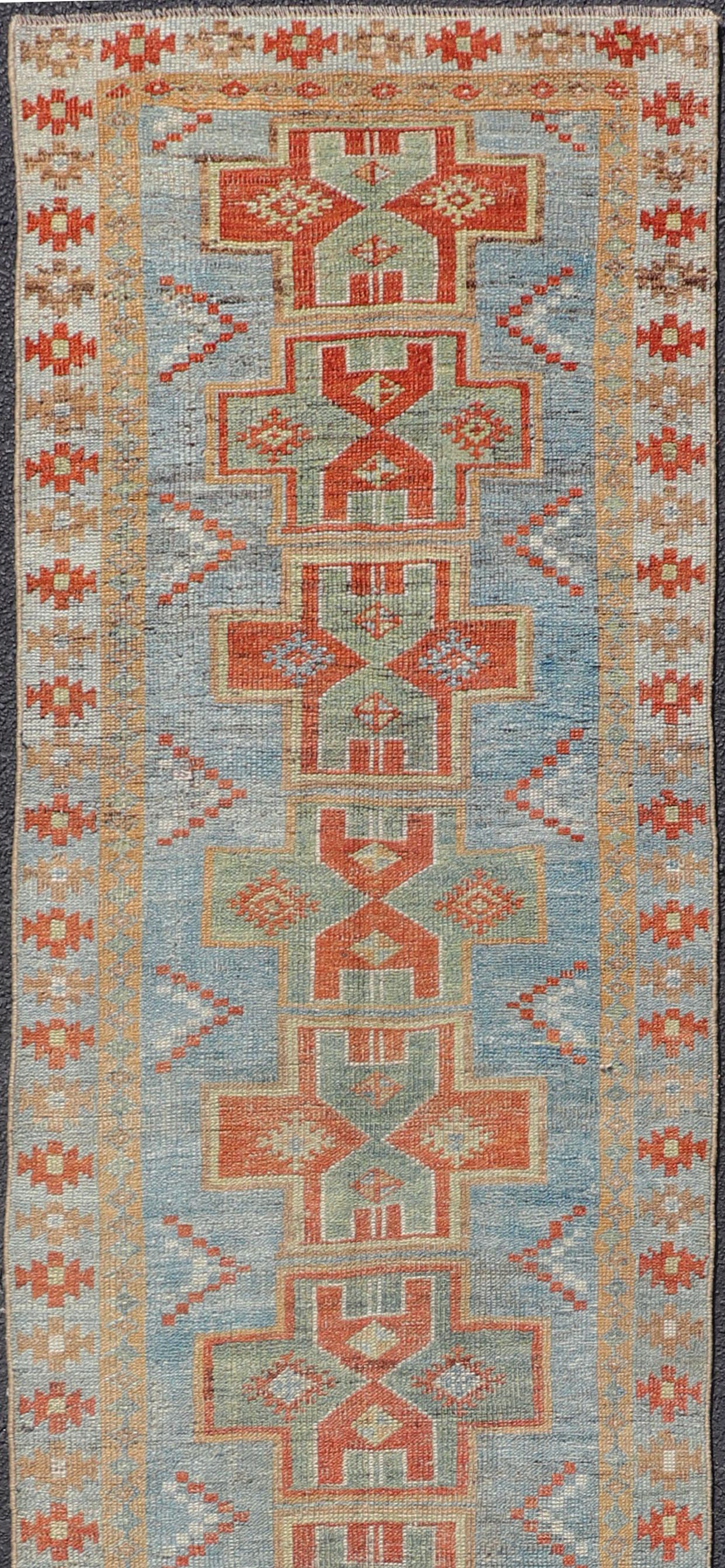 Green, light Blue and red Persian antique Heriz Runner with sub-geometric Paisley design, Keivan Woven Arts/rug SUS-2012-925, country of origin or type: Iran / Malayer, circa 1920. 

This magnificent antique Persian Malayer rug (circa 1920) bears