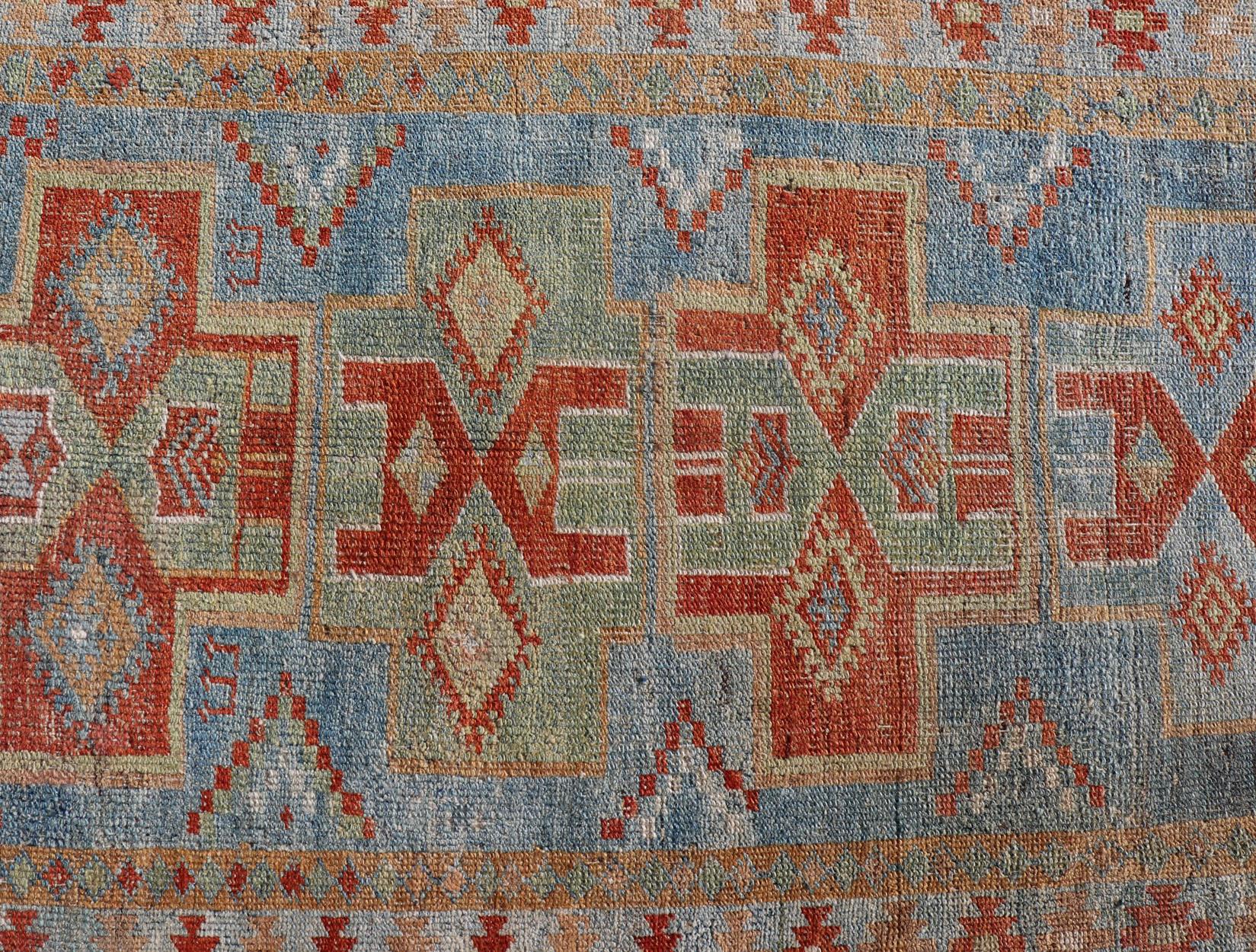 Geometric Medallions Design Antique Persian narrow Runner in Blue, Green and Red In Good Condition For Sale In Atlanta, GA