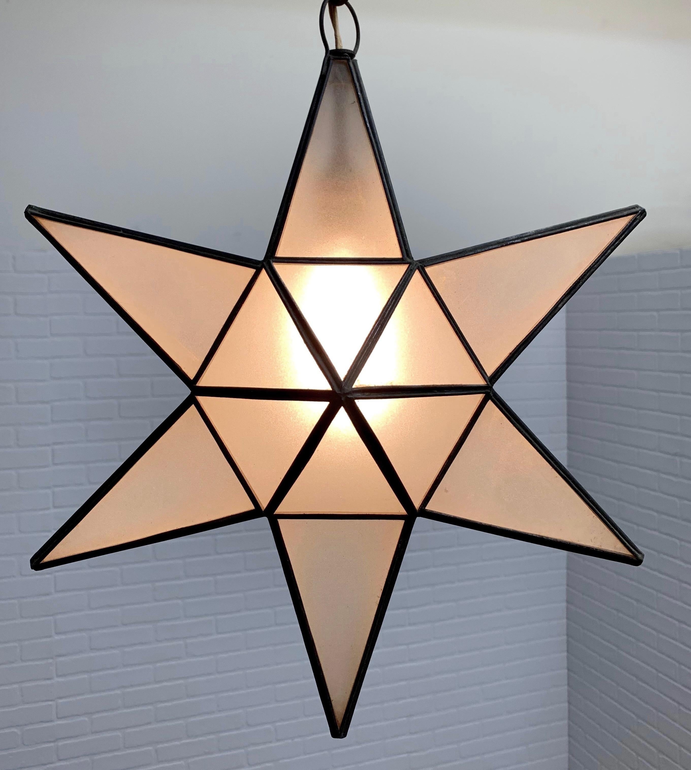 Frosted glass with lead frame form this stunning hanging lamp Height of star is 18