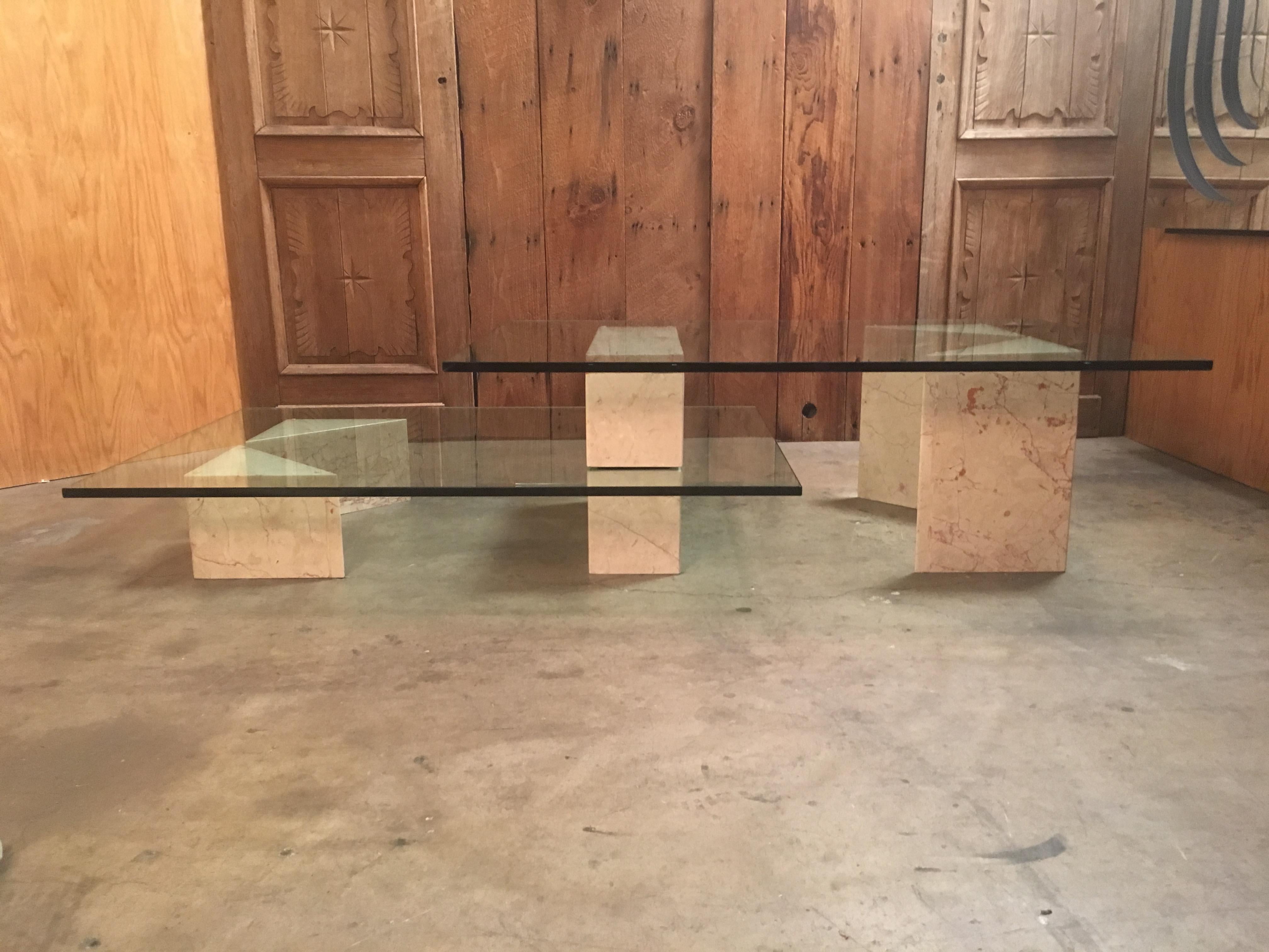 Triangle and rectangle shaped marble that stack to create a multi-level glass platforms
