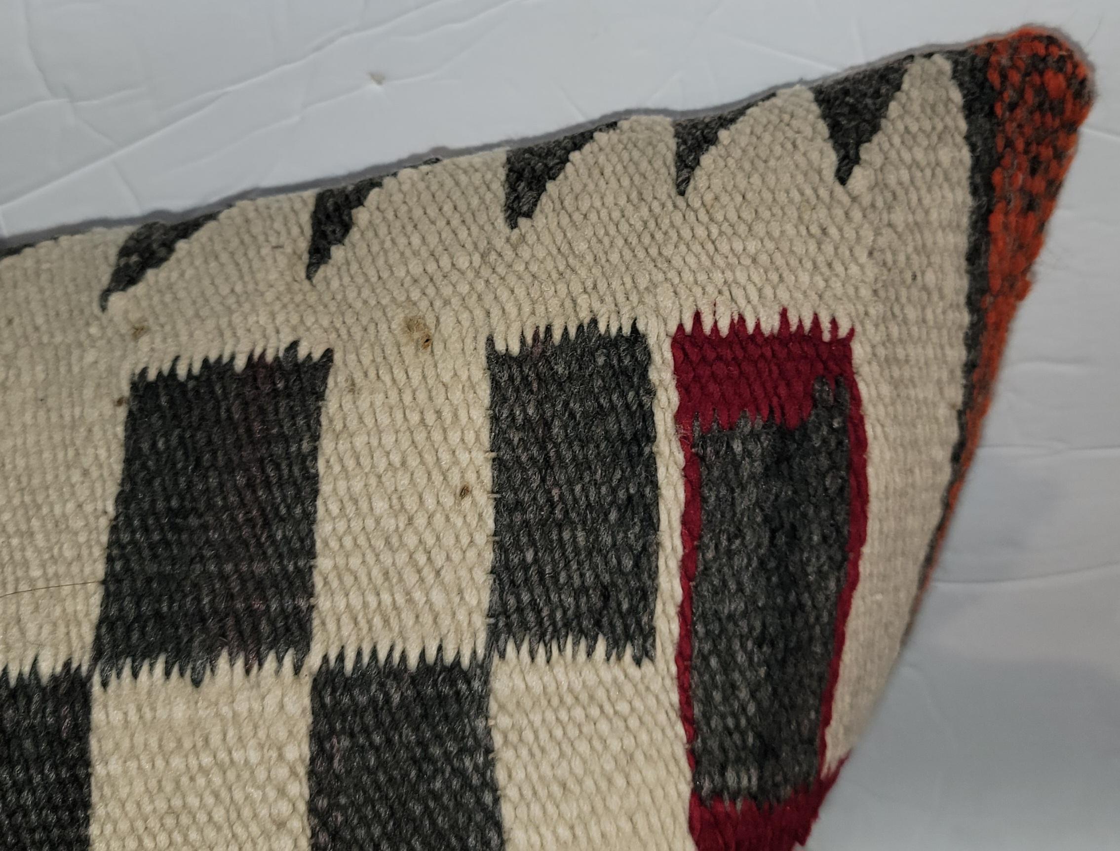 This most unusual Navajo Indian weaving has such unique colors and has a grey linen backing.The insert is down & feather fill.