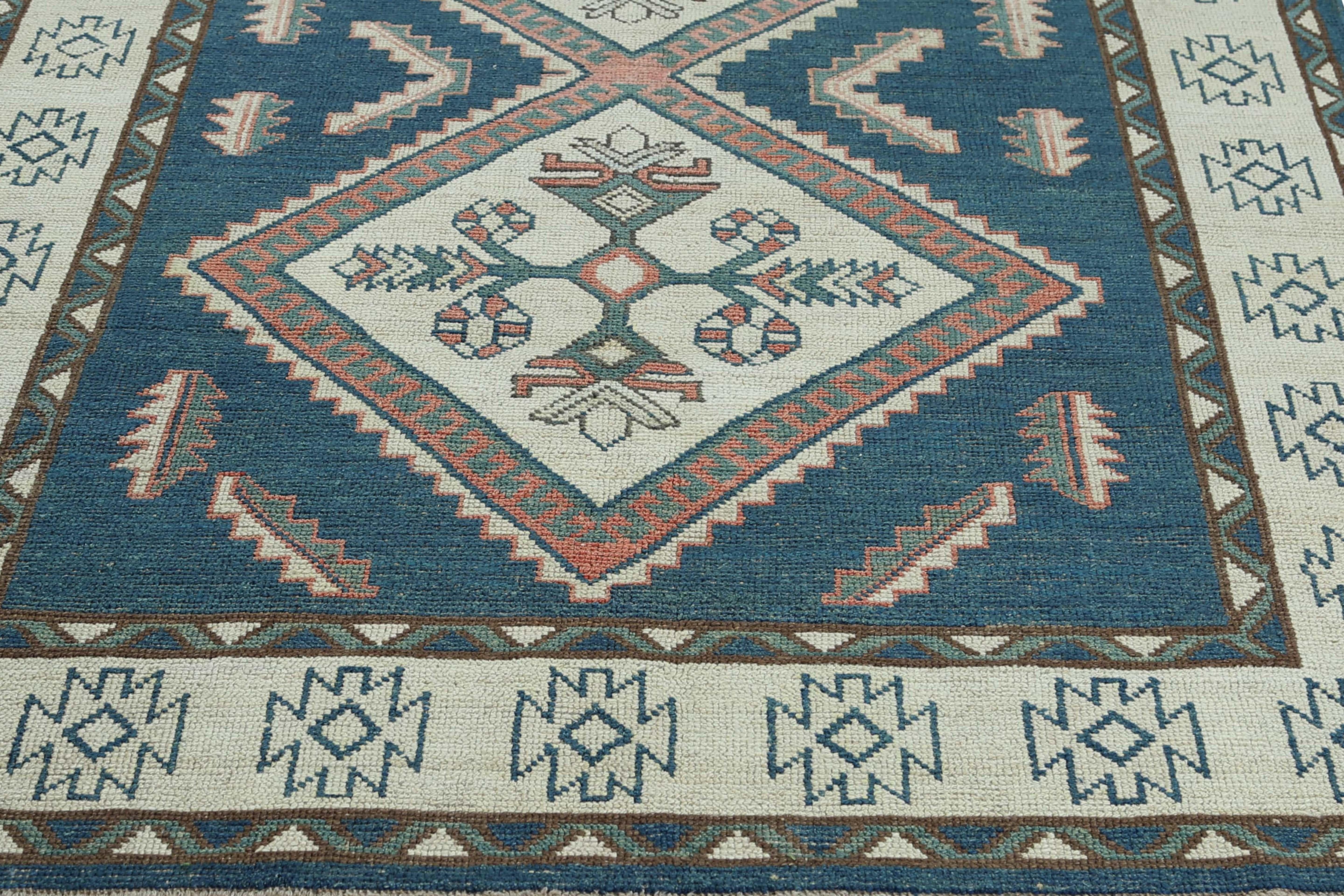 Add a touch of modern sophistication to your living space with this beautiful Turkish rug, measuring 6.3