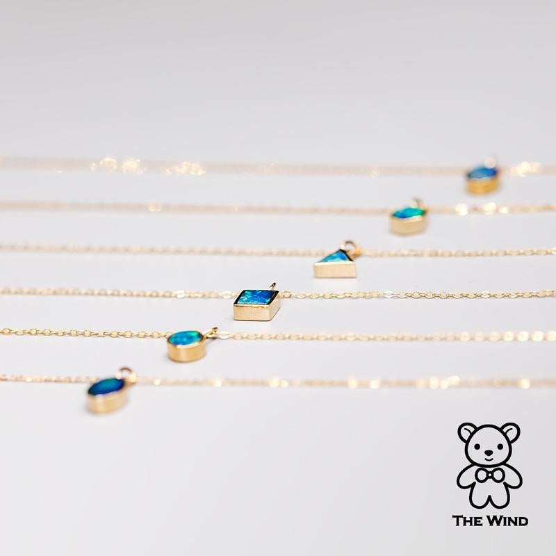 Pendentif géométrique en or jaune 14k en forme d'opale double australienne ovale.


Expédition nationale gratuite par USPS First Class !  Garantie limitée d'un an gratuite !  Sac ou boîte cadeau gratuit avec chaque commande !



L'opale, la reine