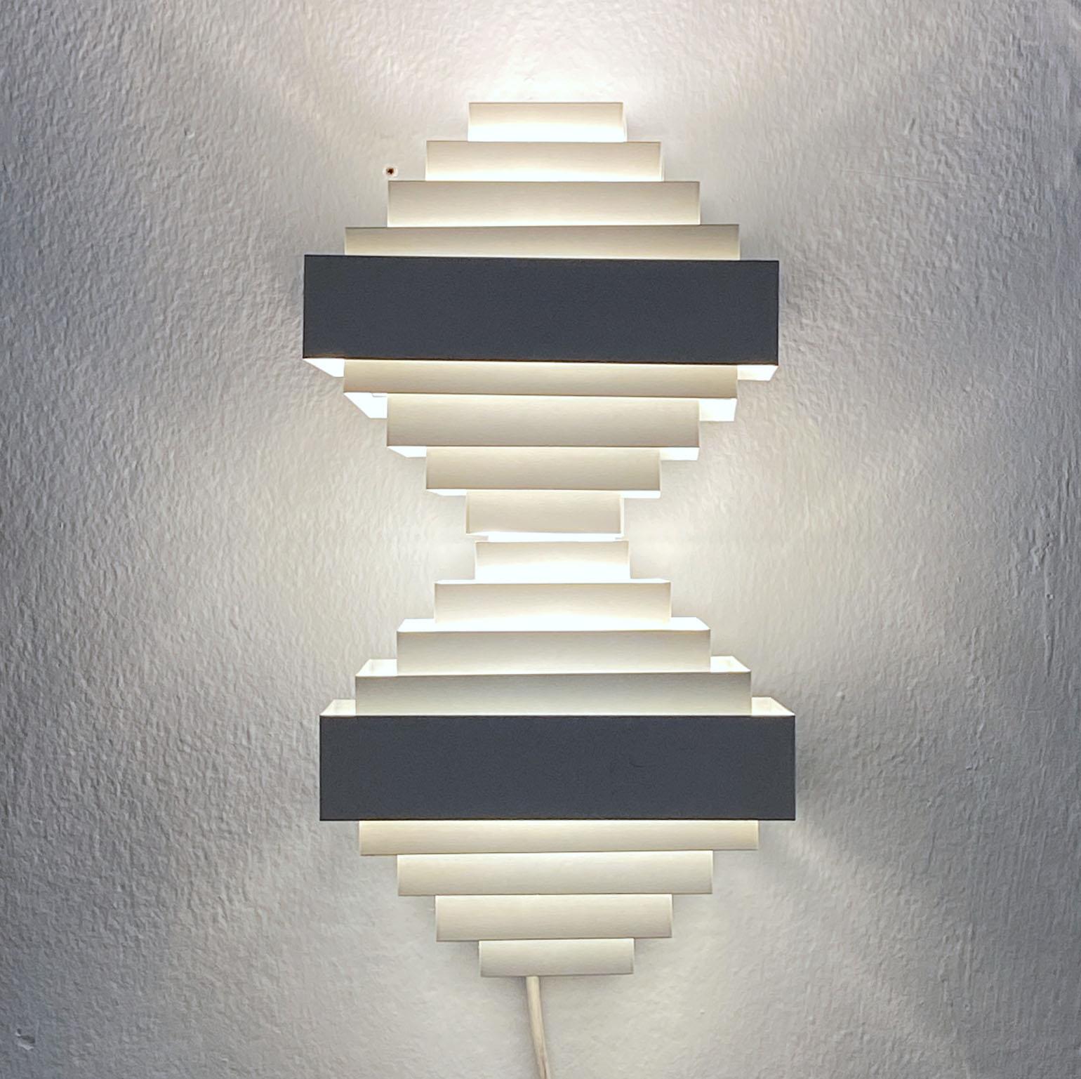 German Geometric pair of White Metal Wall Light by Spectral, 1980's For Sale