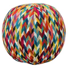 Coussin boule arc-en-ciel à motif géométrique