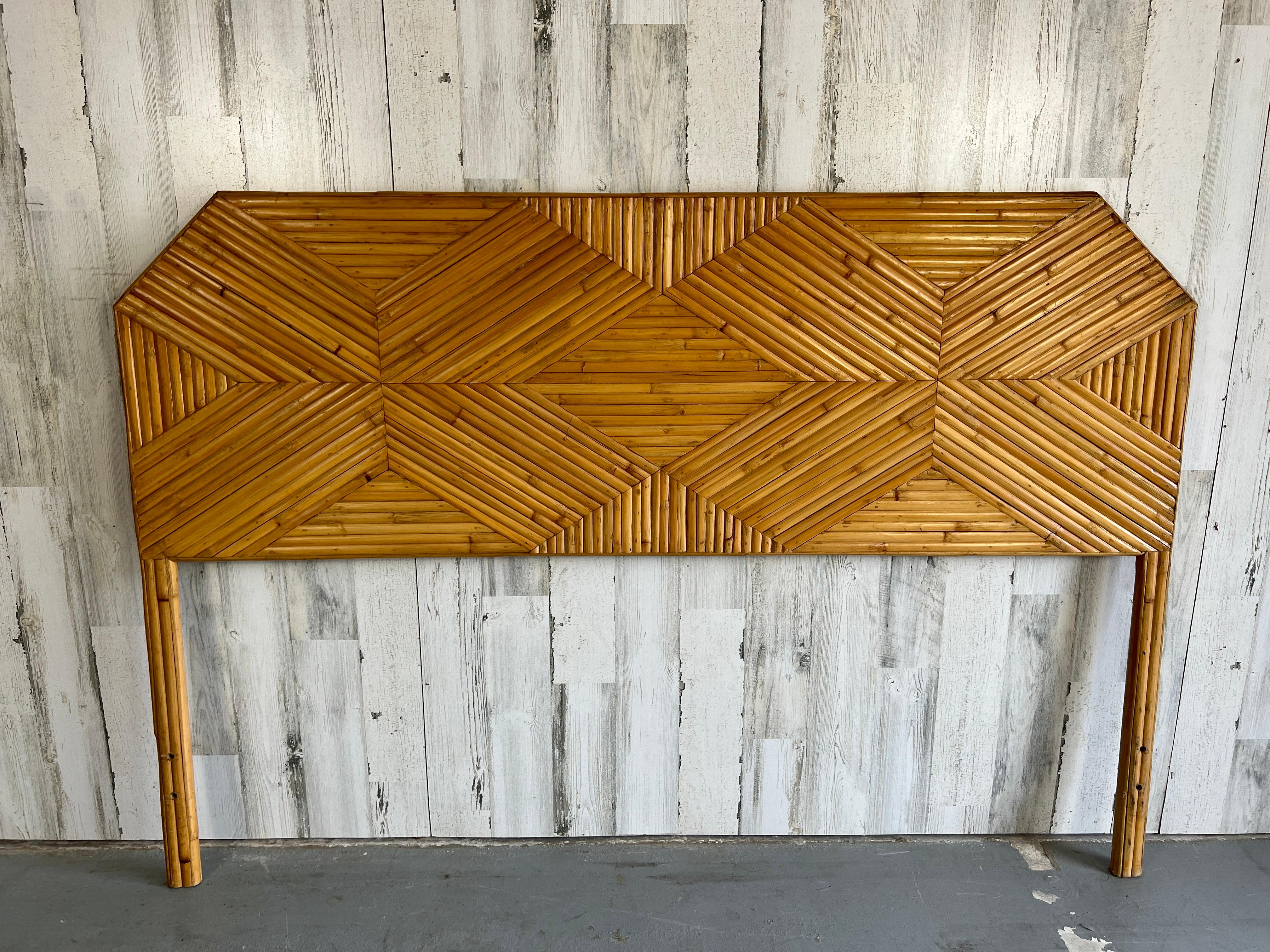 Beautiful queen size split reed headboard. Perfect for a more tropical aesthetic to your bedroom. Slightly bowed in the middle but still in great shape.