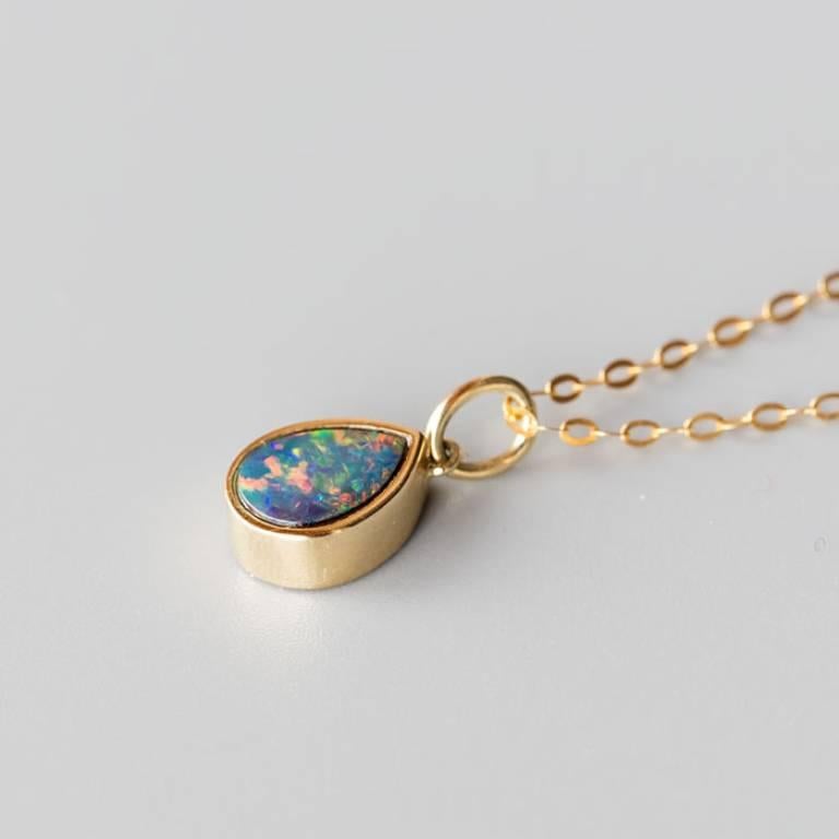 Geometric Pear Shaped Australian Doublet Opal Pendant Necklace 14k Yellow Gold.


Free Domestic USPS First Class Shipping!  Free One Year Limited Warranty!  Free Gift Bag or Box with every order!



Opal—the queen of gemstones, is one of the most