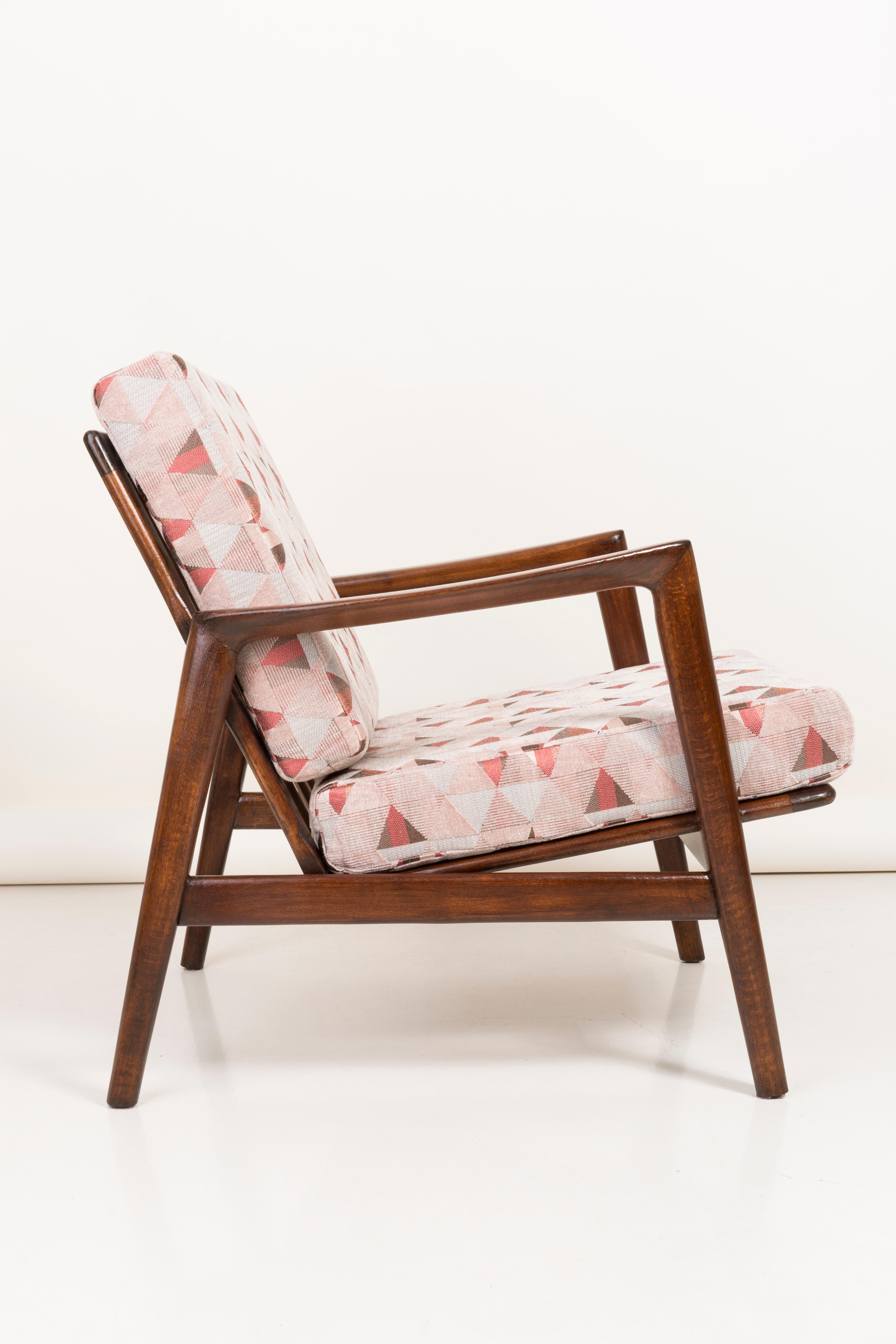 Designed and produced in the 1960s at the Swarzedz Furniture Factory. Armchair style refers to Scandinavian furniture. It was a Polish commodity export.

Furniture after a complete renovation, the wooden frame has been cleaned of the old paint