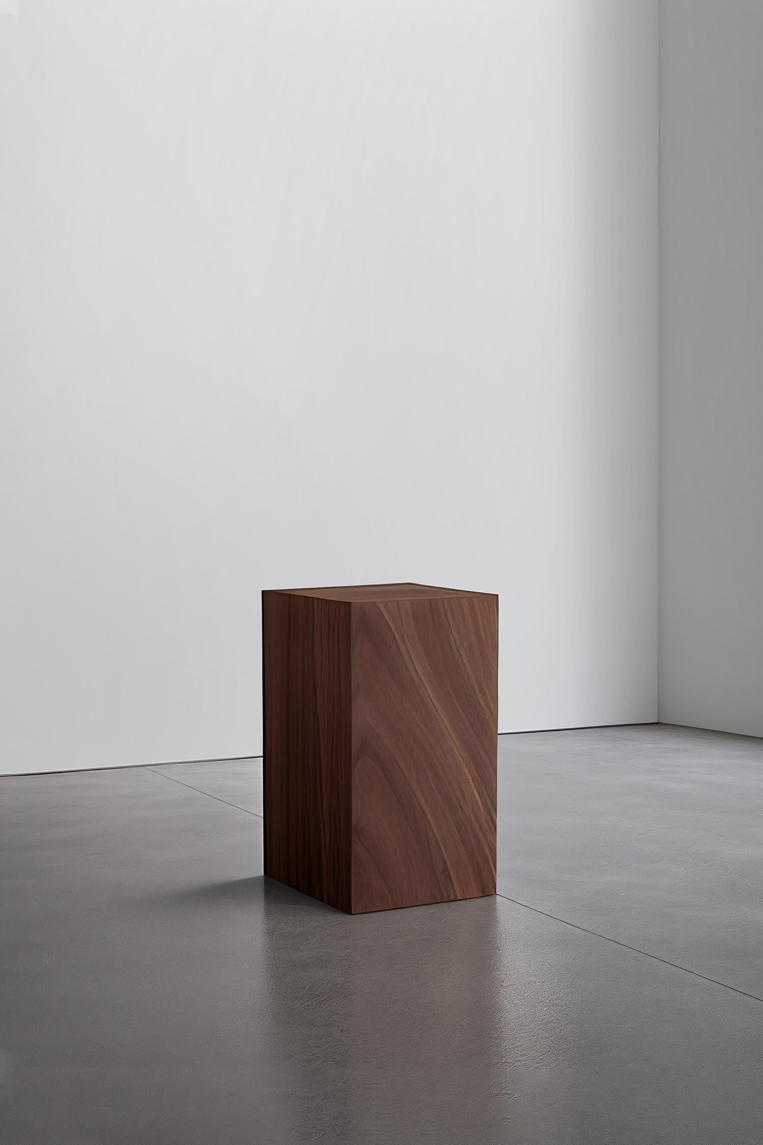 The Basa Plinths, designed by the NONO design team, are a monolithic masterpiece. The natural American sourced wood veneer sings with warm tones that blend seamlessly with the space. Each piece is unique, with its own set of veins, patterns, and
