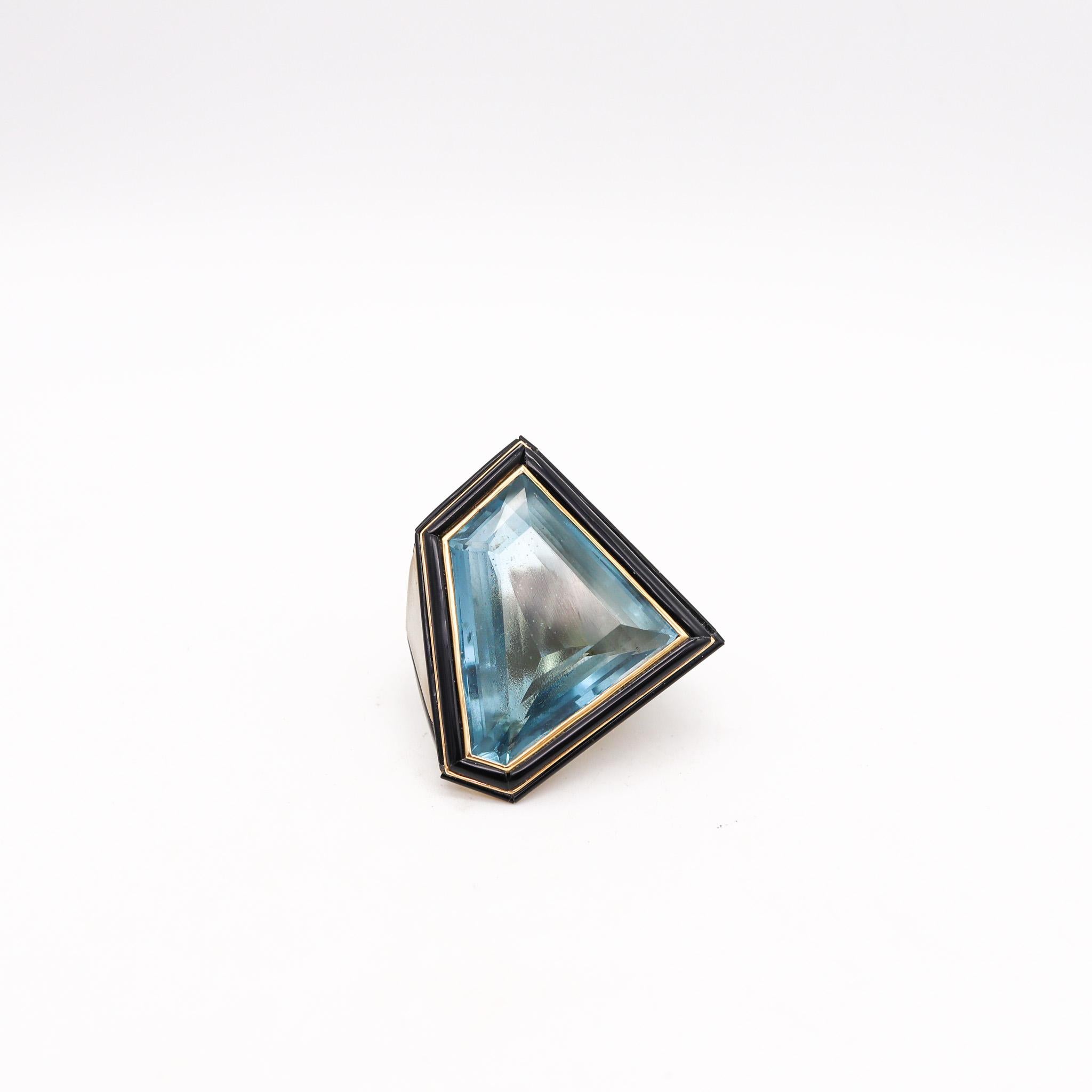 A geometric cocktail ring.

Beautiful oversized geometric cocktail ring, created in Italy during the postmodern period, back in 1980. This fabulous ring is huge and generous in size, it was made with multiple triangular, sharp and faceted shapes, in